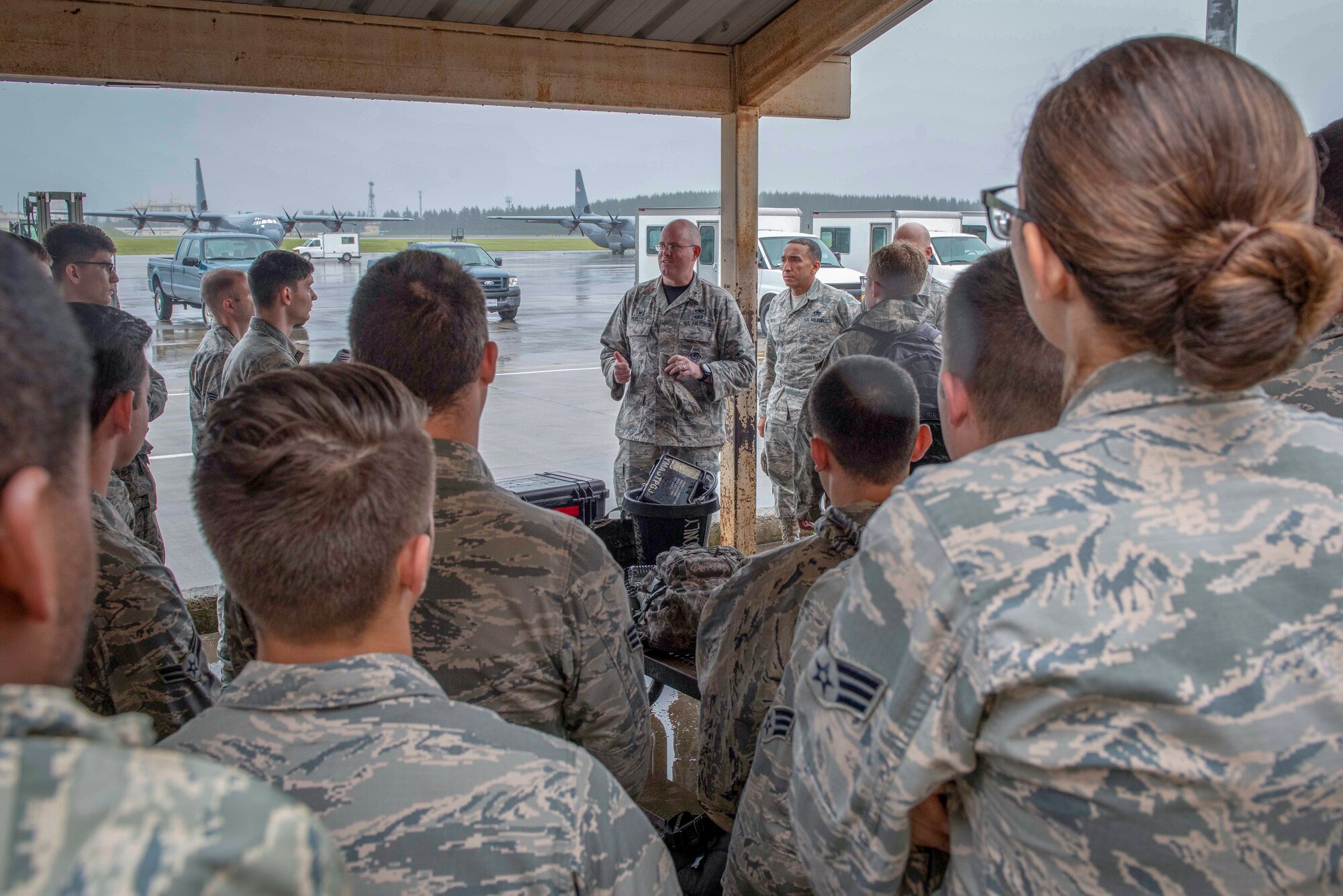 Maj. David Mueller, 374th Aircraft Maintenance Squadron commander, speaks with the Airmen of the 374 AMXS about the importance of looking out for one another during Suicide Prevention Awareness Month at Yokota Air Base, Japan, Sept. 21, 2018.
