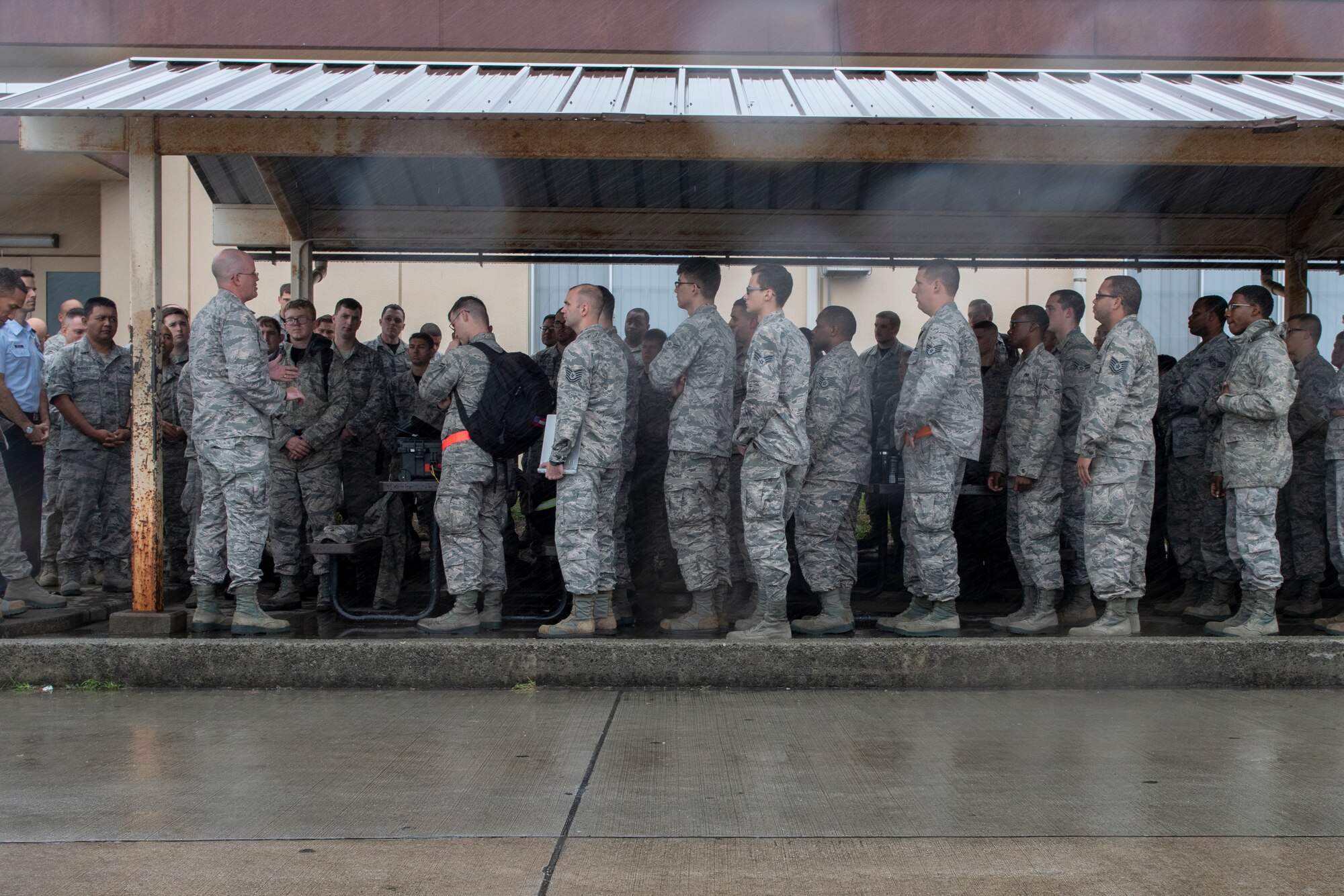 Maj. David Mueller, 374th Aircraft Maintenance Squadron commander, speaks with the Airmen of the 374 AMXS about the importance of looking out for one another during Suicide Prevention Awareness Month at Yokota Air Base, Japan, Sept. 21, 2018.