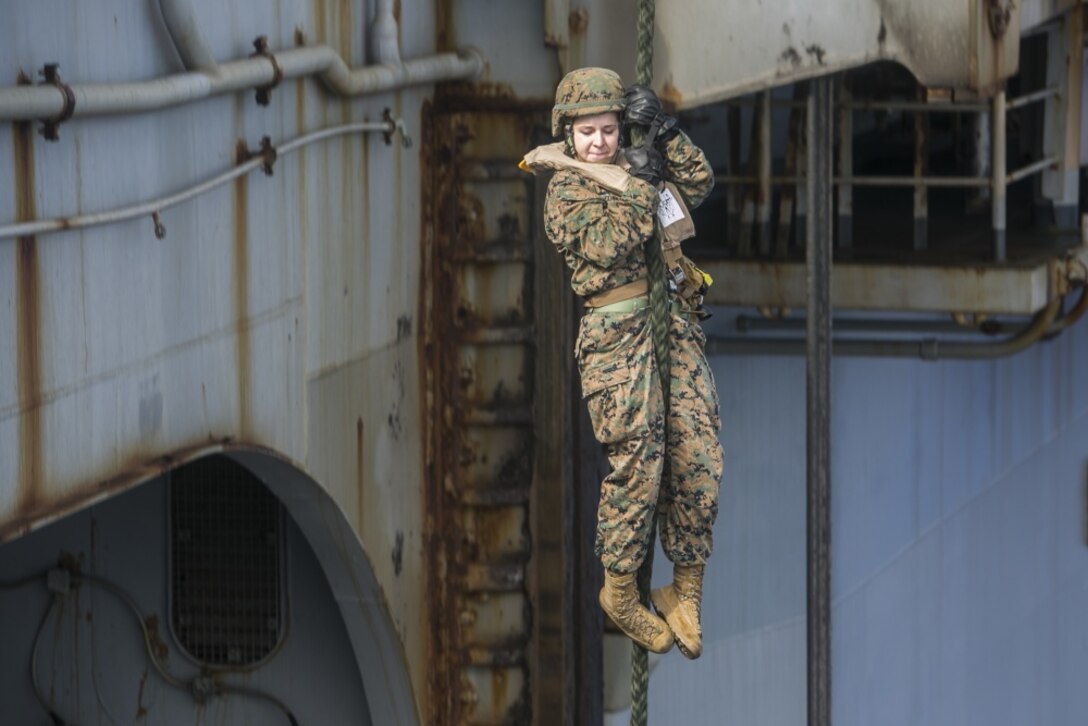 A Marine with the 31st Marine Expeditionary Unit fast ropes during training aboard the amphibious assault ship USS Wasp (LHD 1), underway in the Pacific Ocean, Sept. 19, 2018. Fast roping allows Marines to enter otherwise inaccessible locations from above. The 31st MEU, the Marine Corps’ only continuously forward-deployed MEU, provides a flexible force ready to perform a wide-range of military operations in the Indo-Pacific region. (U.S. Marine Corps photo by Lance Cpl. Hannah Hall)