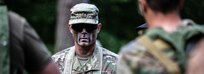 U.S. Army 2nd Lt. Richard Mayfield stands amongst instructors during an exercise at Rapid Trident 18 held at the Yavoriv Combat Training Center, Ukraine, Sept. 4, 2018.
