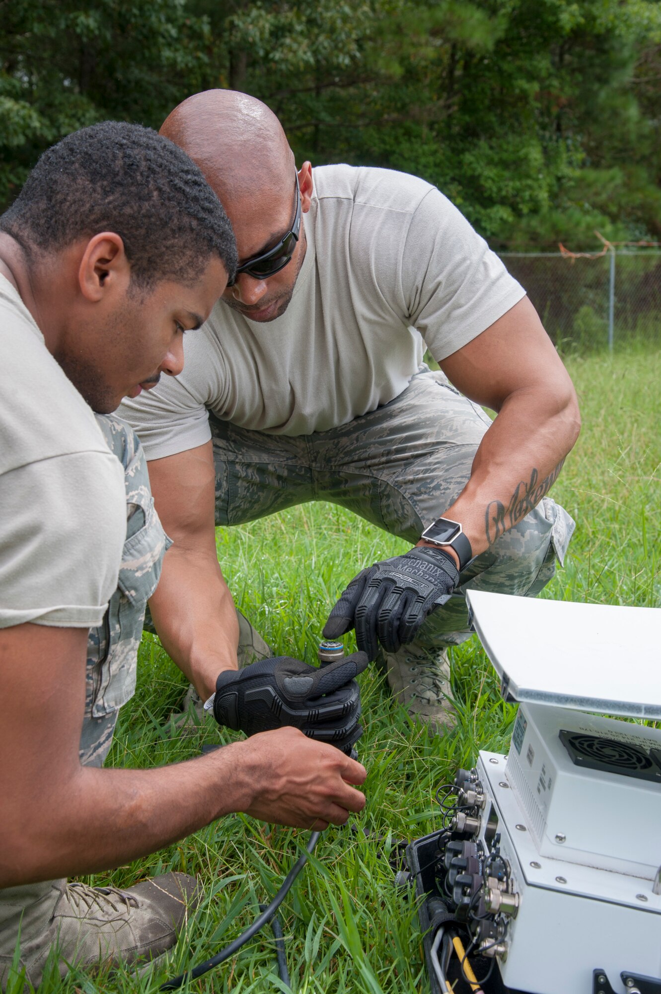 Airmen perform operational checks on equipment.