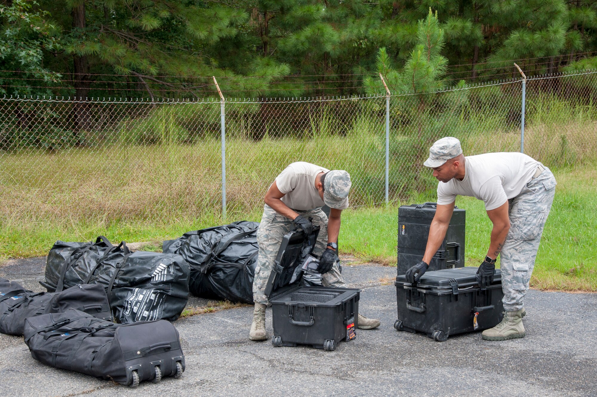 Airmen perform operational checks on equipment.