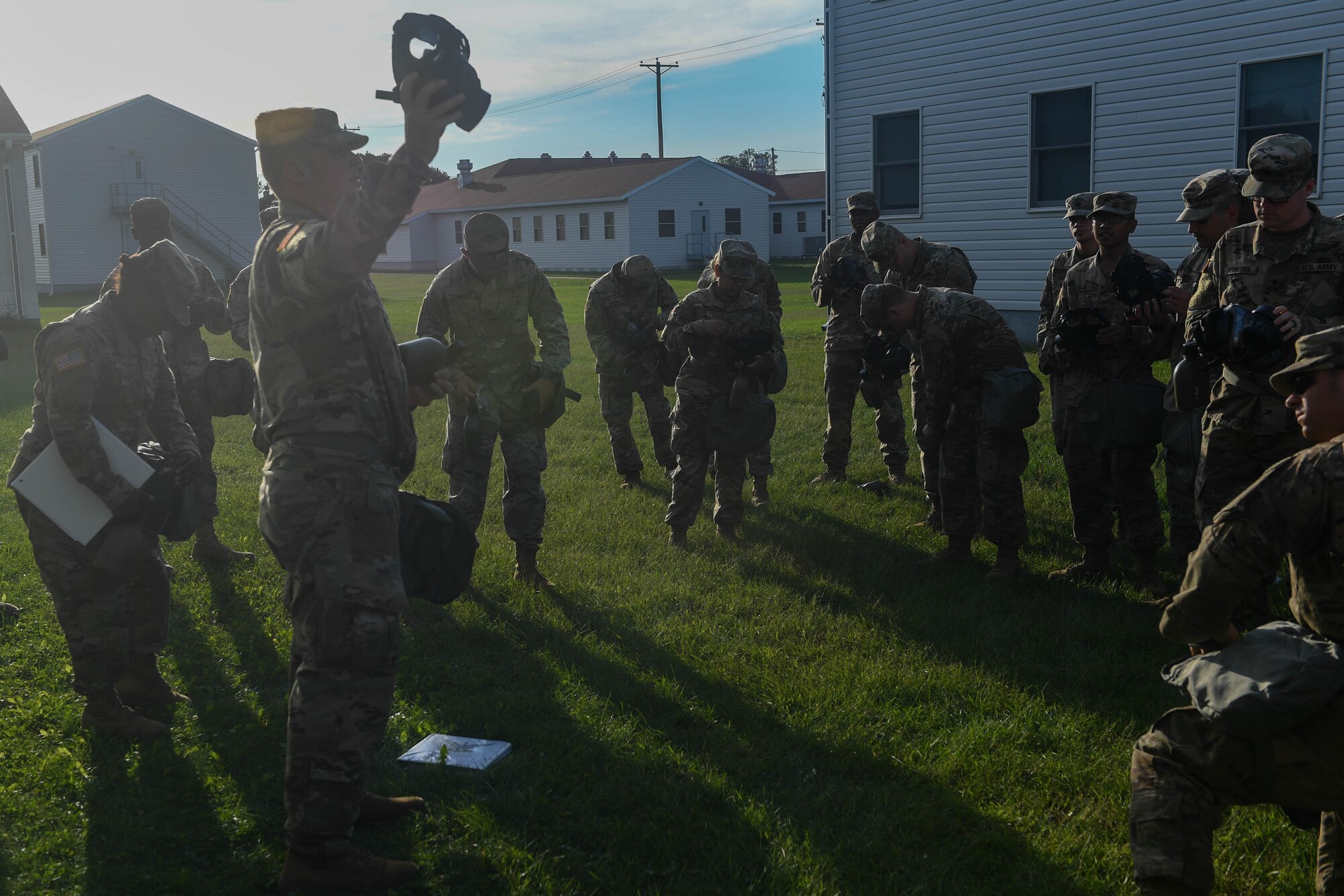 U.S. Army Soldiers assigned to the 689th Rapid Port Opening Element, 832nd Transportation Battalion, 597th Transportation Brigade receive refresher training on their gas mask at Fort McCoy, Wisconsin, Sept. 7, 2018. The Soldiers and U.S. Air Force Airmen carried their gas mask with them 24 hours a day in the event of a simulated chemical attack. (U.S. Air Force photo by Senior Airman Derek Seifert)