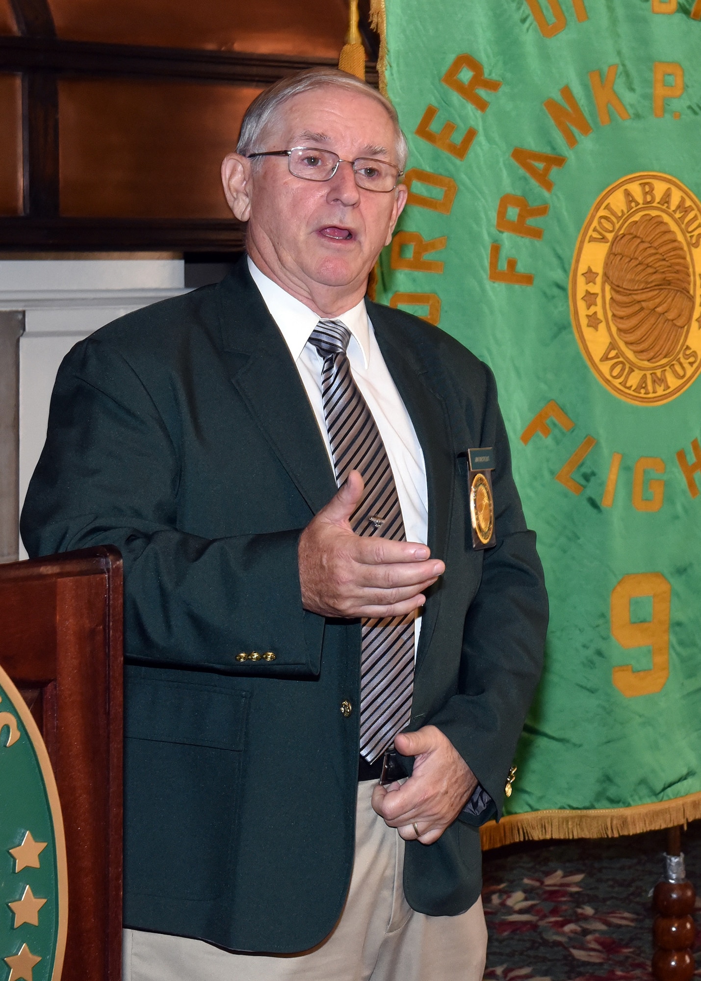 Jim DeStout, Adjutant, Flight 9 – Frank P. Lahm Order of Daedailians, gives remarks as he prepares to present the 2017 Daedalian Colonel Franklin C. Wolfe Weapon Systems Award to the Air Force Light Attack Experiment Team Sept. 20, 2018. The team’s combined efforts made the Phase I Experiment effort a huge success, which, in turn, paved the way for the Phase II Experiment in 2018 and the further development and maturation of the USAF Light Attack Aircraft acquisition strategy. (U.S. Air Force photo/Al Bright)