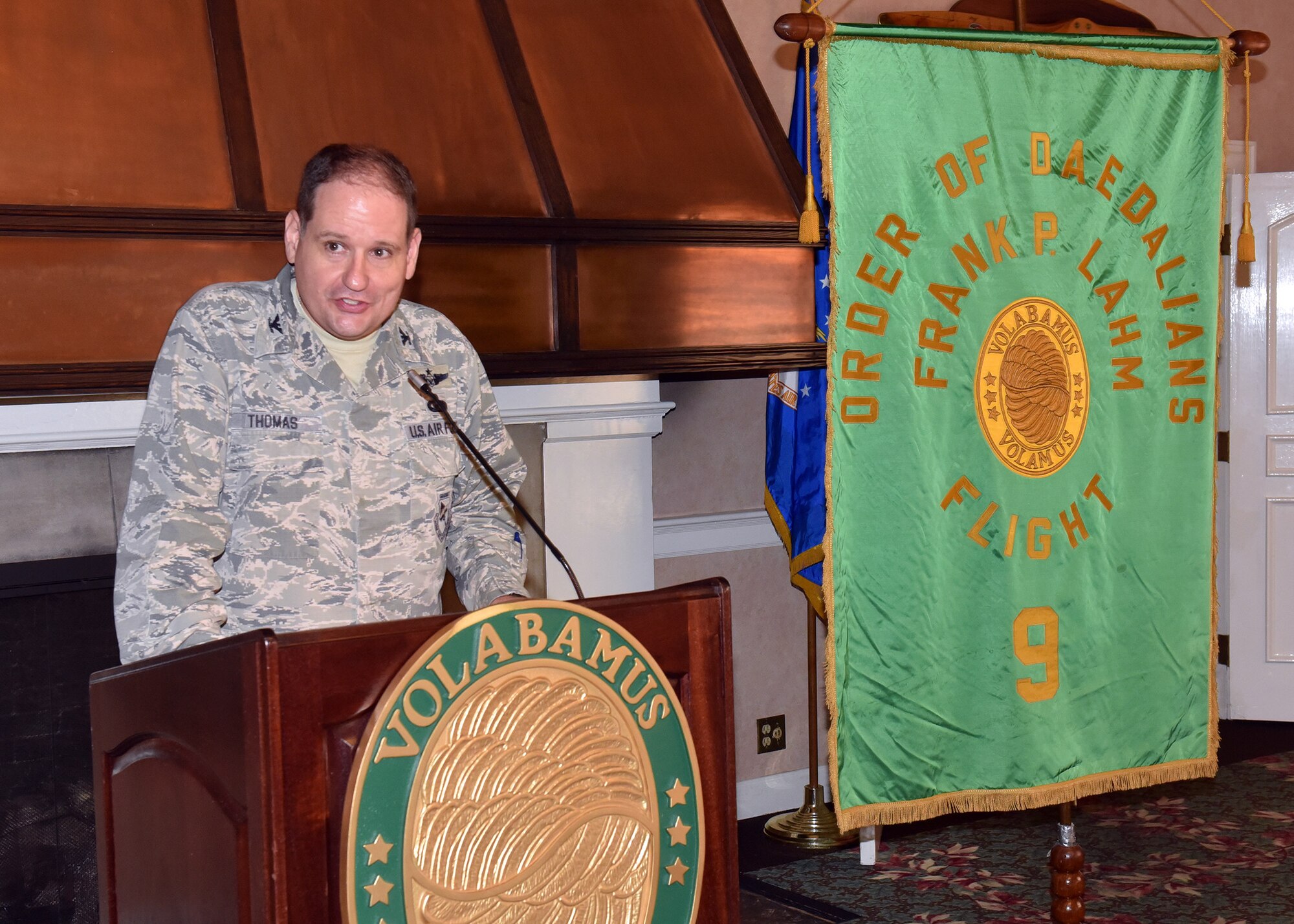 Col. Anthony Thomas, Air Force Life Cycle Management Center Advisor to the Air Force Strategic Development Planning and Experimentation (SDPE) office for the Light Attack Aircraft Experiment, Phase I, delivers remarks to the audience at an award presentation ceremony    Sept. 20, 2018, where Jim DeStout, Adjutant, Flight 9 – Frank P. Lahm Order of Daedailians, presented the 2017 Daedalian Colonel Franklin C. Wolfe Weapon Systems Award to the Air Force Light Attack Experiment Team. The team’s combined efforts made the Phase I Experiment effort a huge success, which, in turn, paved the way for the Phase II Experiment in 2018 and the further development and maturation of the USAF Light Attack Aircraft acquisition strategy.  (U.S. Air Force photo/Al Bright)