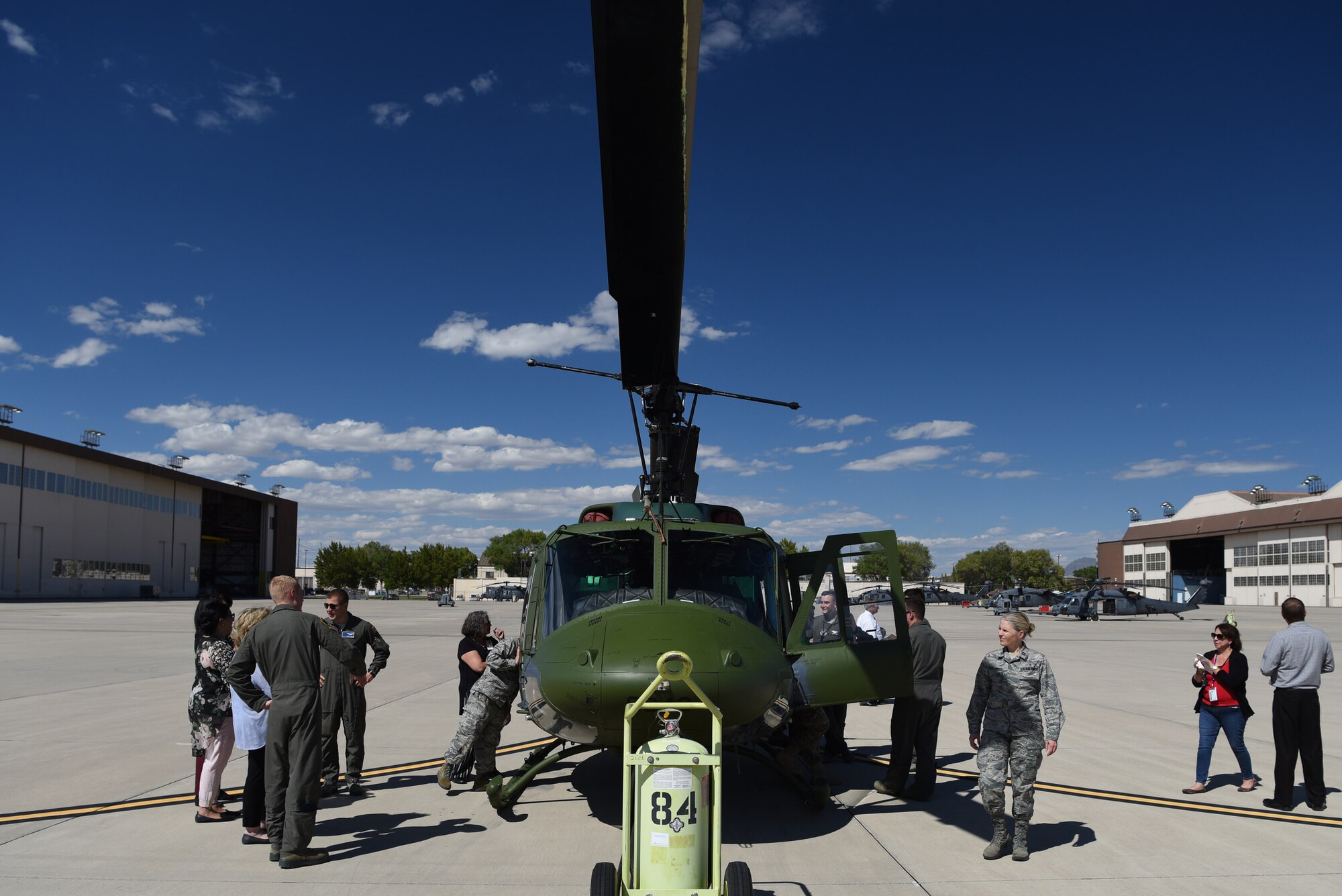 Airmen of the 377th Medical Group and members of the local healthcare community tour a UH-1N Huey assigned to the 58th Special Operations Wing during a community partner open house at Kirtland Air Force Base, N.M., Sept. 24, 2018. During the event, representatives from area hospitals visited the 377th MDG as well the 377th SOW. (U.S. Air Force photo by Senior Airman Eli Chevalier)