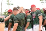 PENSACOLA, Fla. - Marines celebrate their first gold medal victory since 2000 as elite military softball players from around the Department of Defense compete to crown this year's best during the 2018 Men's Armed Forces Softball Championship held at NAS Pensacola, Fla. from September 18-22.  Teams from the Army, Marine Corps, Navy, Air Force and athletes from the Coast Guard competing with the Navy compete in a three-day tournament to determine the champion.  (U.S. Navy photo by Mass Communication Specialist 2nd Class Jerine Lee/Released)