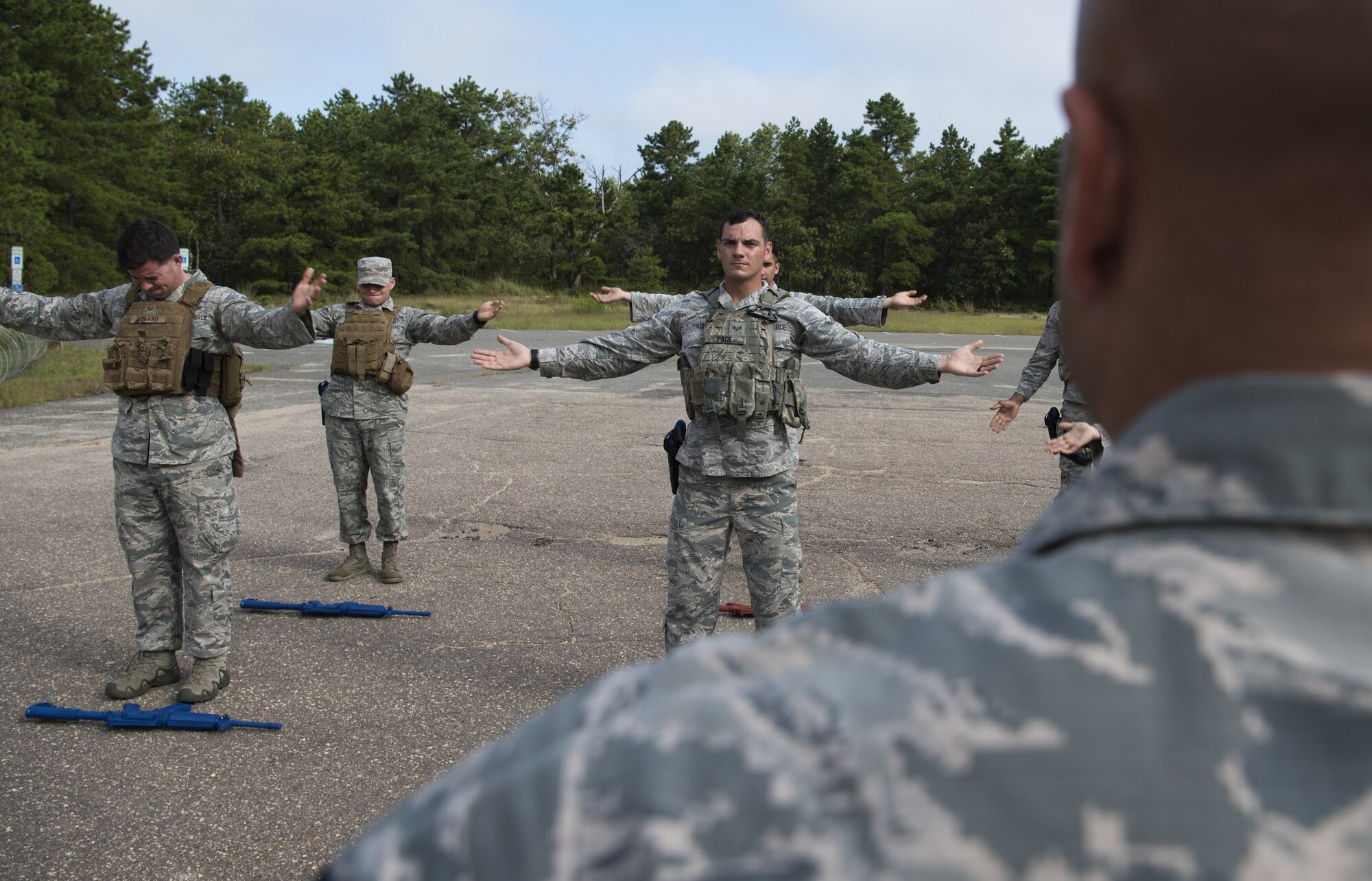 The Air Mobility Command team exercises on Joint Base McGuire-Dix-Lakehurst, New Jersey, Sept. 5, 2018. The team trained for three weeks together before the 2018 Air Force Defender Challenge. The challenge is a worldwide Air Force competition that pits security forces teams against each other in weapons scenarios, dismounted operations and combat endurance tests.(U.S. Air force photo by Airman Ariel Owings)