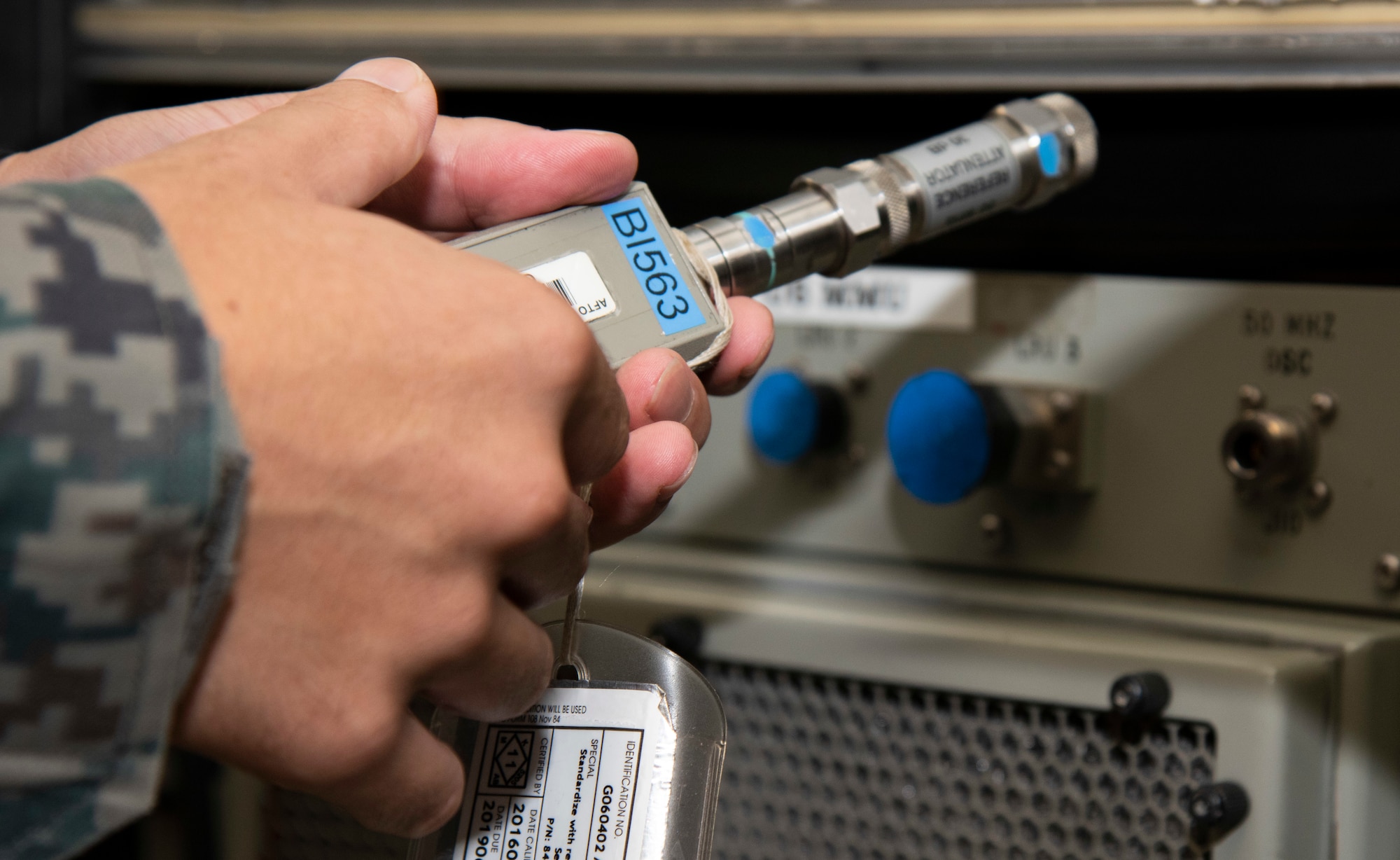 Japan Air Self-Defense Force Tech. Sgt. Yuki Satake, a 4th Air Defense Missile Group measure equipment maintenance technician, prepares to align cables for an avionics systems test during a Bilateral Exchange Program visit at Misawa Air Base, Japan, Sept. 20, 2018. The 35th Maintenance Squadron avionics intermediate systems shop, who support aircraft by screening, testing and repairing avionics components, was one of many units to participate in the BEP. (U.S. Air Force photo by Senior Airman Sadie Colbert)