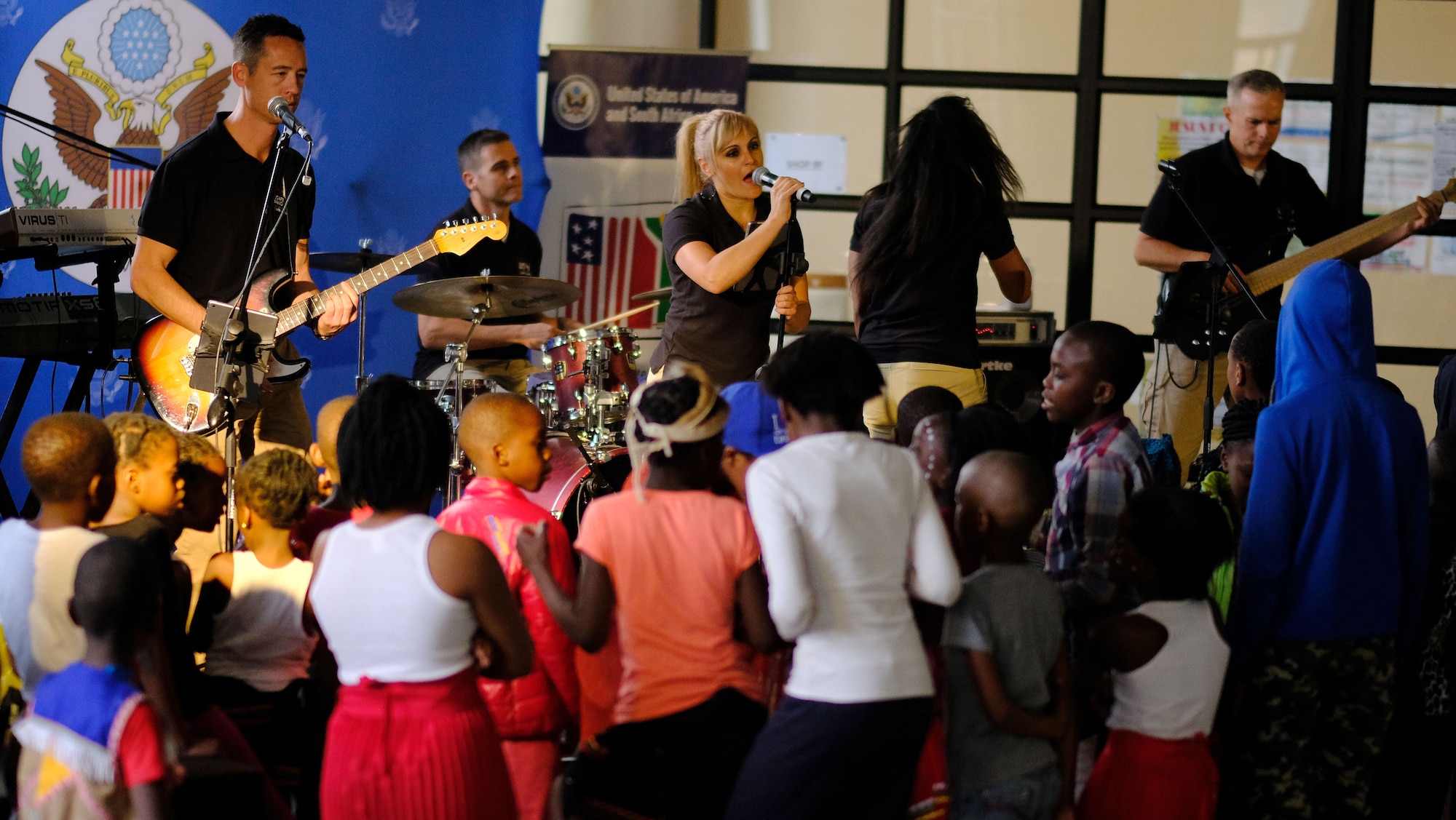 Members of the United States Air Forces in Europe- Air Forces Africa band  Touch ’n Go perform a concert for children at Ponte City in Johannesburg, South Africa, September 21, 2018. The band’s performance provides a unique opportunity for the U.S. to develop strong connections with its African partners and their communities. (US Army photo by Staff Sgt. Jeffery Sandstrum)
