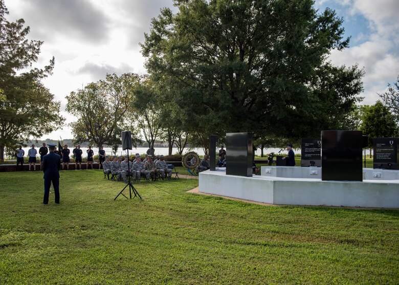 U.S. service members attend the POW/MIA 24-hour Recognition Run closing ceremony at Memorial Park on Joint Base Langley-Eustis, Virginia, Sept. 21, 2018.