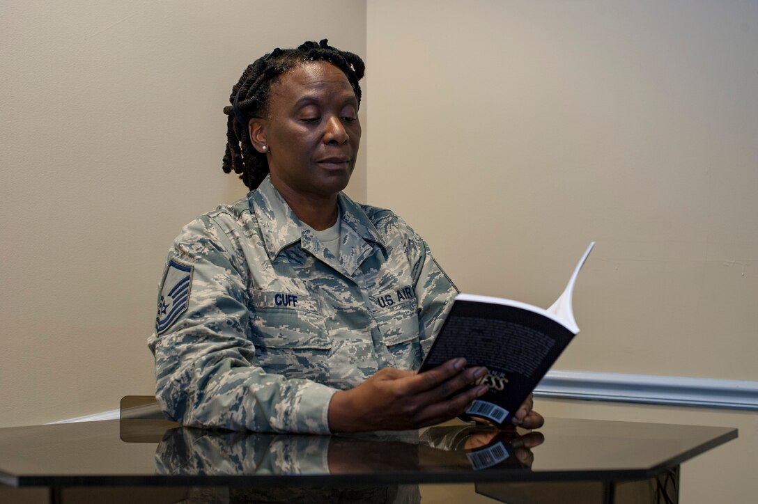 Master Sgt. Lorraine Cuff, 88th Aerial Port Squadron unit education training manager and air reserve technician with the 514th Air Mobility Wing, Joint Base McGuire-Dix-Lakehurst, N.J., poses for a photo September 4, 2018. Cuff decided to write after attending seminars with McGuire Achievers Toastmasters Club 3111, a local chapter of Toastmasters International, which aims to improve the communication and leadership skills of its members. (U.S. Air Force photo by Senior Airman Ruben Rios)