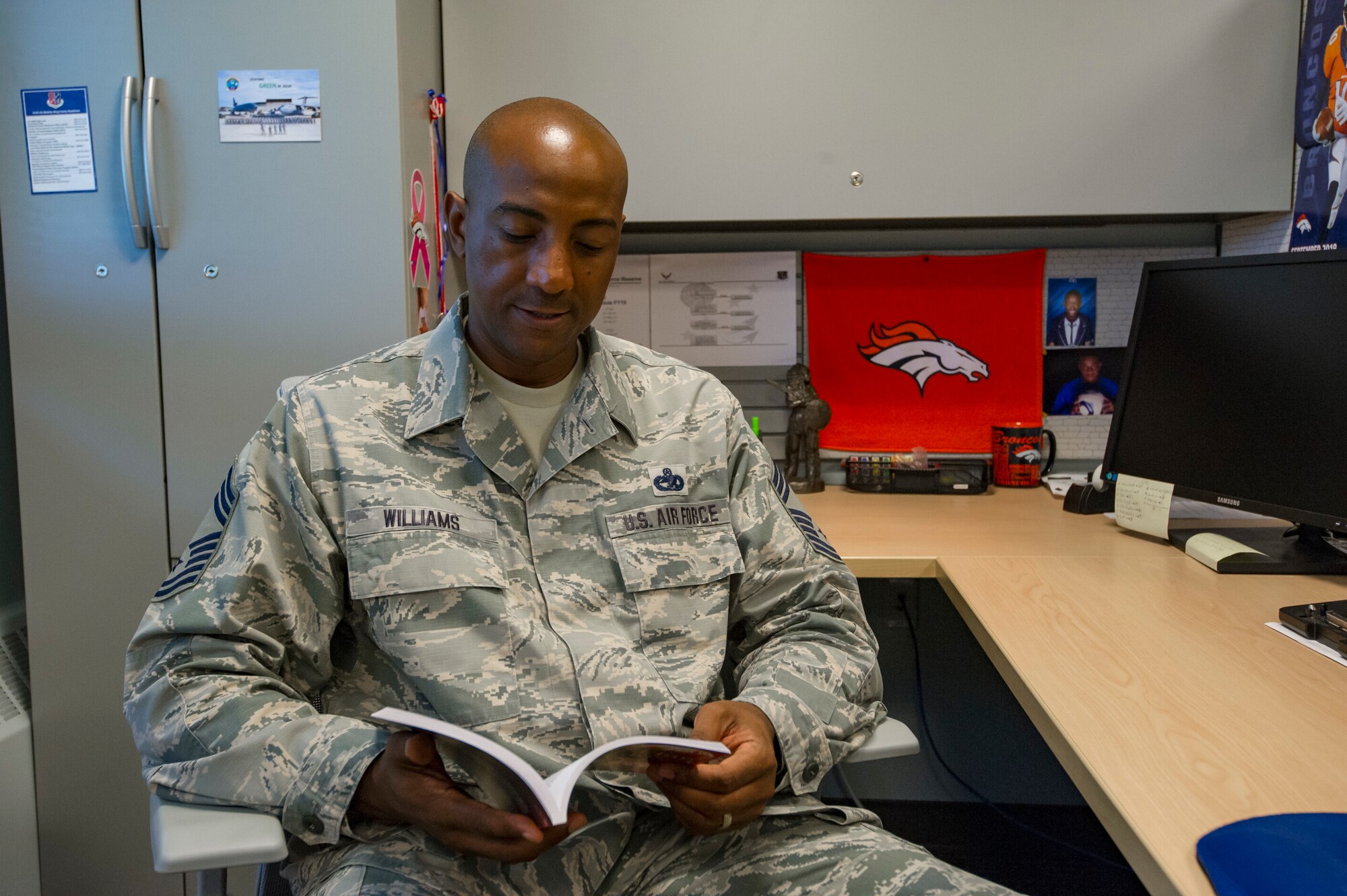 Chief Master Sgt. Lawayne Williams, 88th Aerial Port Squadron chief enlisted manager and superintendent of operations with the 514th Air Mobility Wing, Joint Base McGuire-Dix-Lakehurst, N.J., poses for a photo September 16, 2018. Williams finished writing a novel while deployed or activated. (U.S. Air Force photo by Senior Airman Ruben Rios)