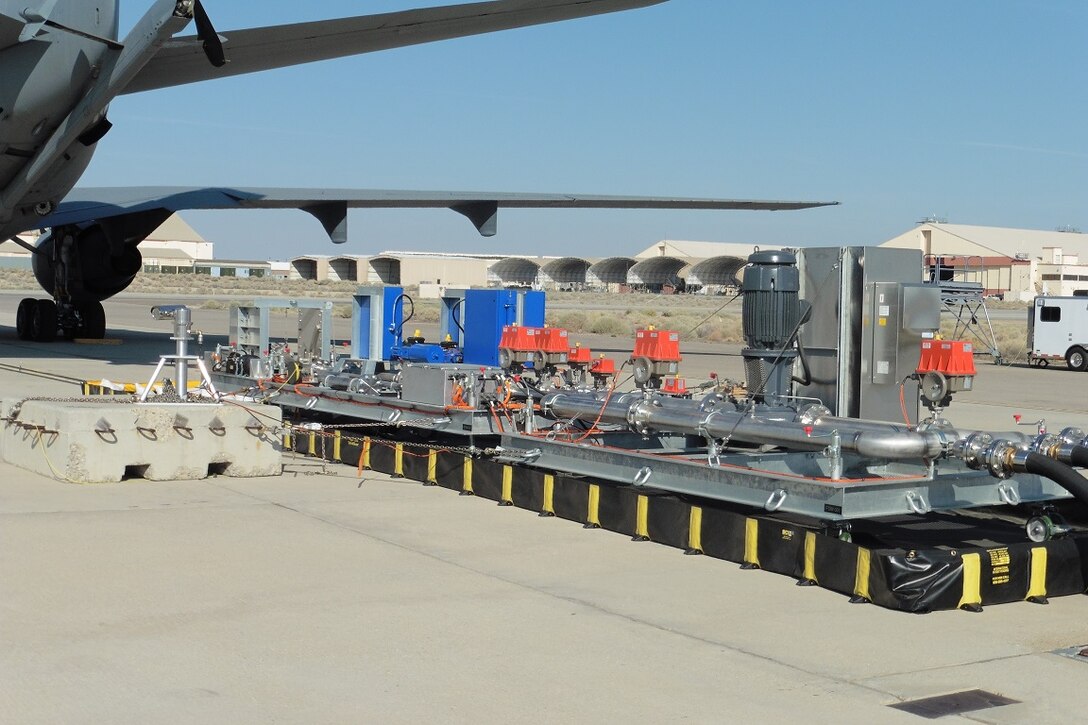 The Receiver Simulation Tool sits behind a KC-10 Extender aerial refueler on the Edwards flightline earlier this year. The RST is a ground-based system designed to simulate events that happen during aerial refueling between receiver aircraft and new tankers such as the KC-46 Pegasus, Australian KC-30 and Italian 767. The team has been testing the RST with legacy tankers such as the KC-10 and KC-135 to get baseline data before testing on the new aerial refuelers. (U.S. Air Force photo by Brad White)