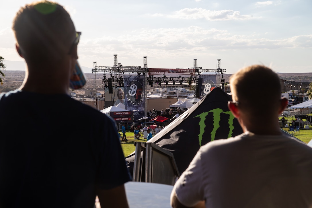 Marines listen to Ha Ha Tonka, a rock band from Missouri, during the BaseFest music festival, held at Lance Cpl. Torrey L. Gray Field, aboard the Marine Corps Air Ground Combat Center, Twentynine Palms, Calif., Sept. 22, 2018. Hosted by USAA, with the help of Marine Corps Community Services, BaseFest gave Marines, their families and the local community the opportunity to unwind and listen to live music, while building bonds between the installation and the community. (U.S. Marine Corps photo by Lance Cpl. Dave Flores)