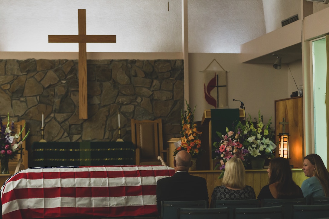Family members of Tech. Sgt. Dorothy L. Angil mourn their loss during Angil’s funeral ceremony at Twentynine Palms United Methodist, Twentynine Palms, Calif., Sept. 22, 2018. Angil enlisted in the Marine Corps in 1943, in support of World War II. She also went on to support the Korean War war effort. (U.S. Marine Corps photo by Lance Cpl. Rachel K. Young)
