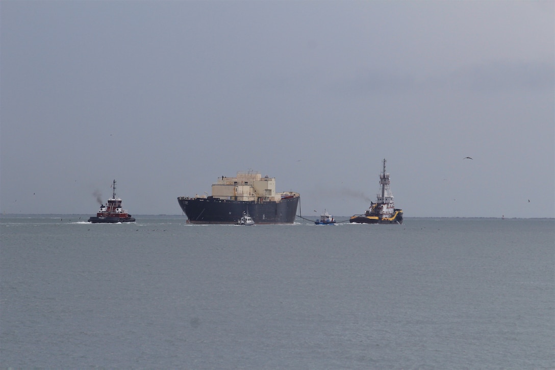 The STURGIS, which was the world’s first floating nuclear power plant, is towed from the Galveston shipping channel into open water Tuesday morning September 25, 2018 as it heads toward Brownsville, Texas for final shipbreaking and recycling. The vessel is being towed from Galveston where it has undergone radiological decommissioning that included the safe removal of all components of its deactivated nuclear reactor and all associated radioactive waste that was formerly onboard. (U.S. Army photo by Becca Nappi)