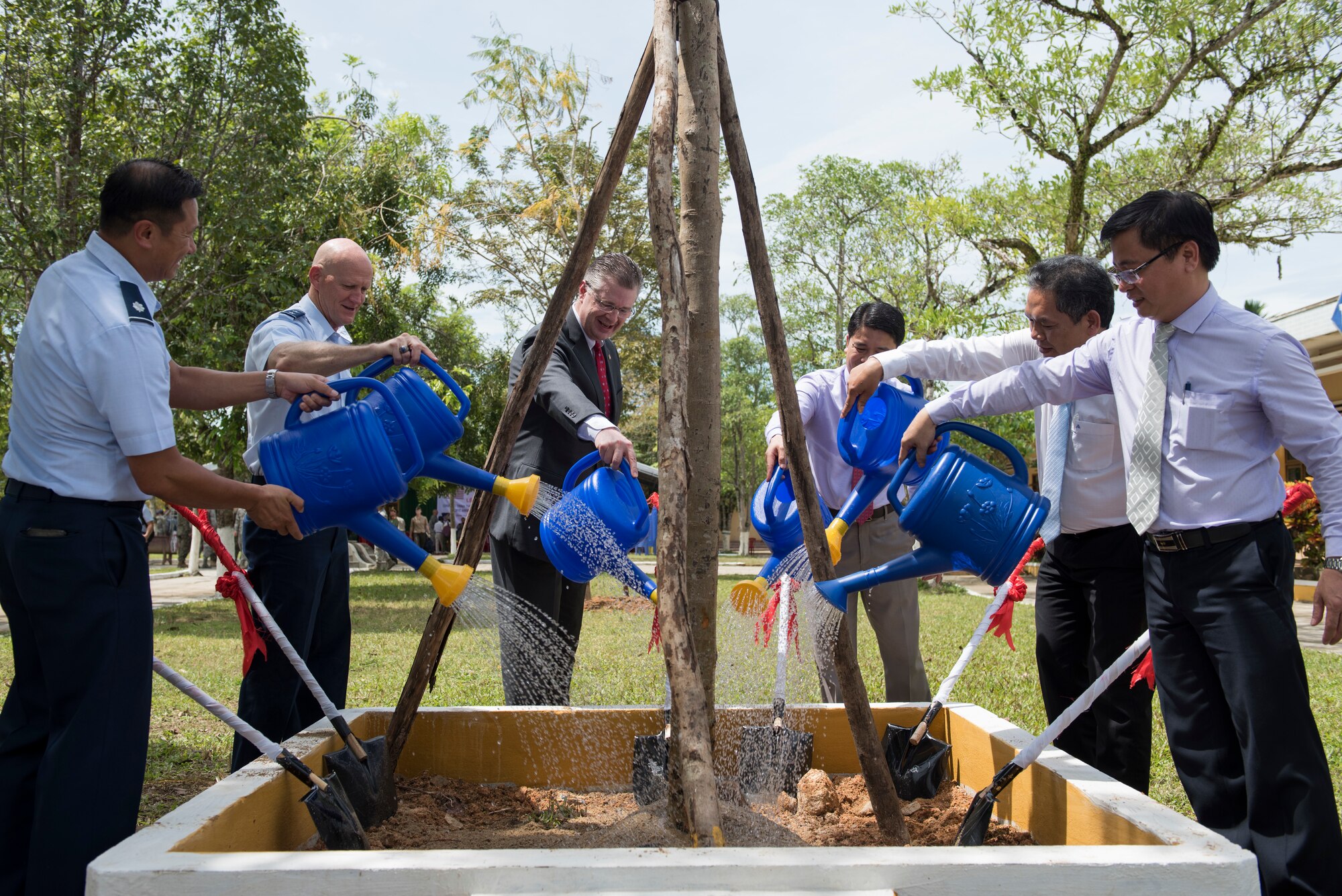 Pacific Angel (PAC ANGEL) 18-2 senior leaders and Vietnam officials participate in a tree planting ceremony at Tien Tho Primary School, in Tien Tho commune, Tien Phuoc district, Vietnam, Sept. 17, 2018.