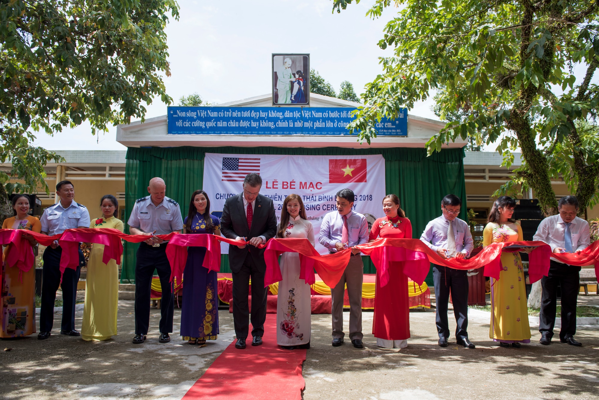 Pacific Angel (PAC ANGEL) 18-2 senior leaders and Vietnam officials participate in a ribbon cutting ceremony at Tien Tho Primary School, in Tien Tho commune, Tien Phuoc district, Vietnam, Sept. 17, 2018.