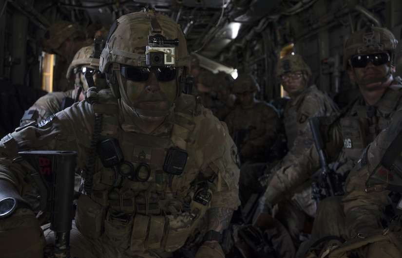 Soldiers with the 101st Airborne Division prepare to exit a Marine Heavy Helicopter Squadron 772 (HMH-772) CH-53E Super Stallion during a training exercise near Joint Base McGuire-Dix-Lakehurst, New Jersey, Sept. 6, 2018. The Soldiers were expected to exit as fast as possible in an organized fashion and clear for the CH-53E to take off immediately after. (U.S. Air Force photo by Airman Ariel Owings)