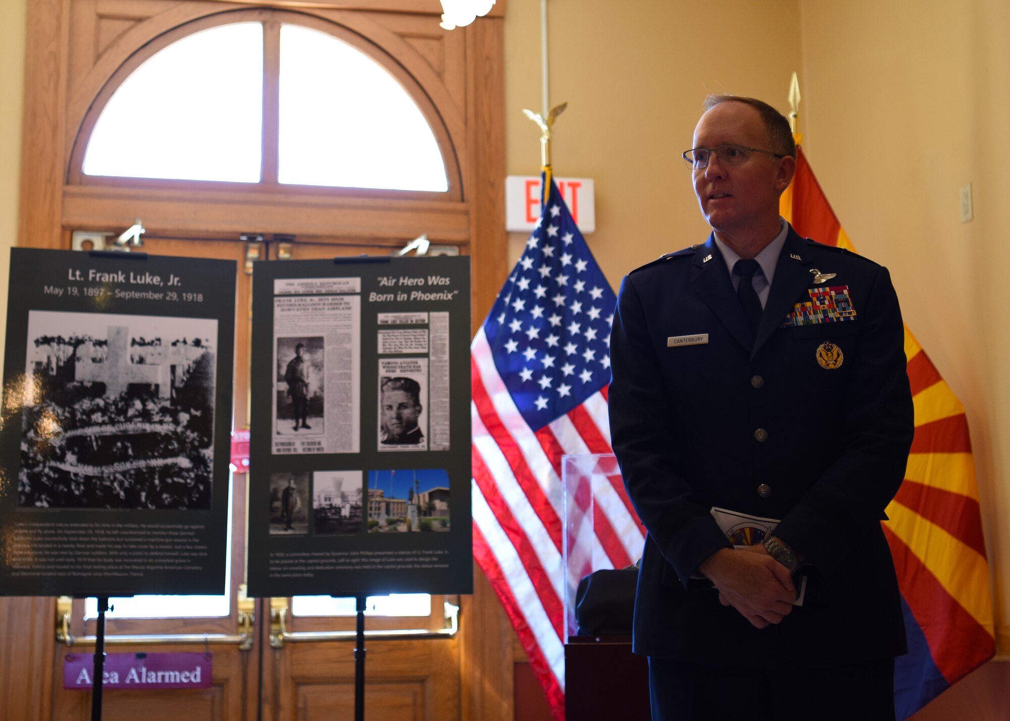 Brig. Gen. Todd Canterbury, 56th Fighter Wing commander, listens to a curator at the Arizona Capitol Museum after a ceremony for the 100th Anniversary of the death of Lt. Frank Luke Jr. Sept. 26, 2018 in Phoenix.