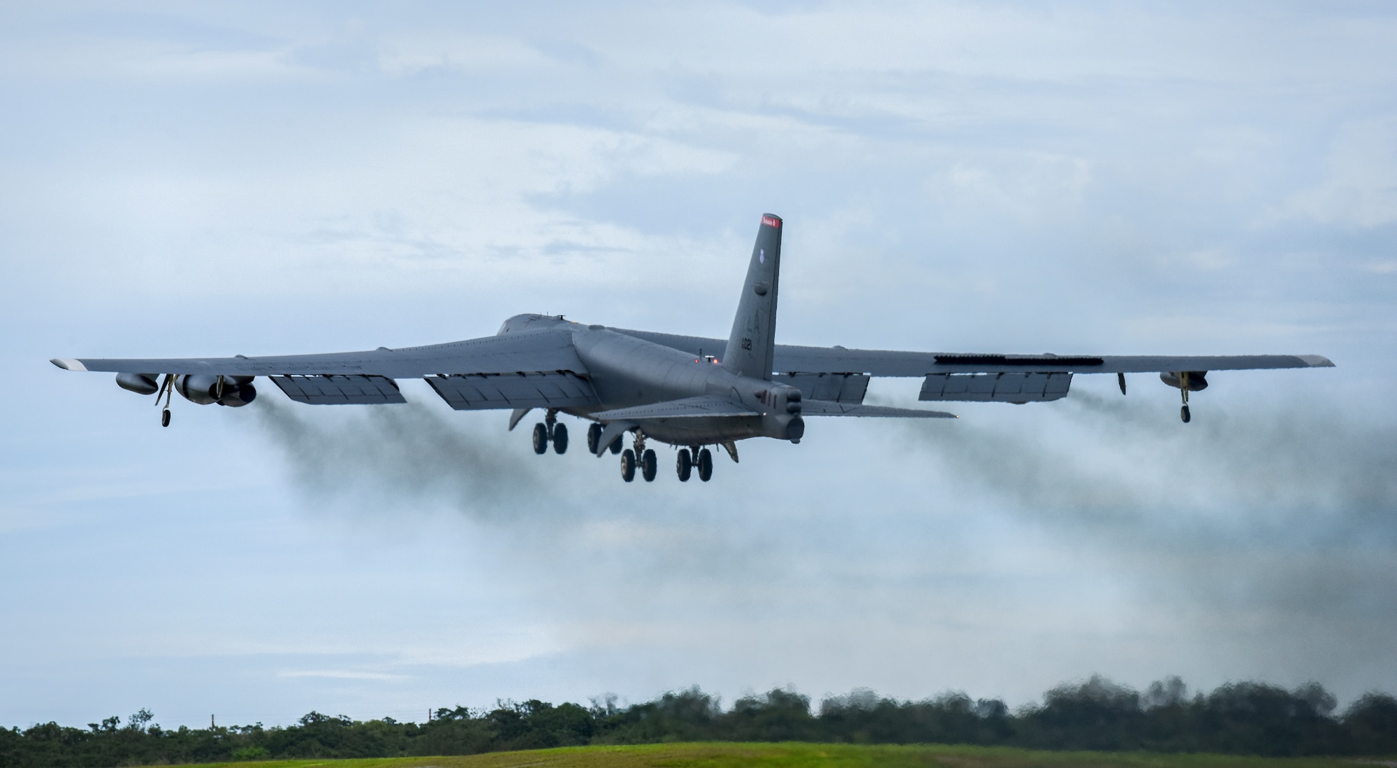 A U.S. Air Force B-52H Stratofortress bomber takes off from Andersen Air Force Base, Guam, for a routine training mission in the vicinity of the South China Sea and Indian Ocean, Sept 23, 2018 (HST).