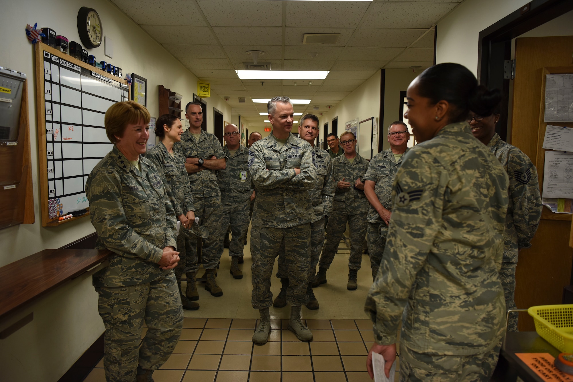 U.S. Air Force Senior Airman Lauren Eady, far right, 51st Medical Operation Squadron emergency medical technician, briefs U.S. Air Force Lt. Gen. Dorothy Hogg, Air Force Surgeon General, U.S. Air Force Chief Master Sgt. Steven Cum, Medical Enlisted Force and Enlisted Corps chief, and U.S. Air Force Chief Master Sgt. Yvonne Shaw, back right, Pacific Air Forces Medical Enlisted Force chief, and other medical professionals about the functions of the emergency trauma bay.