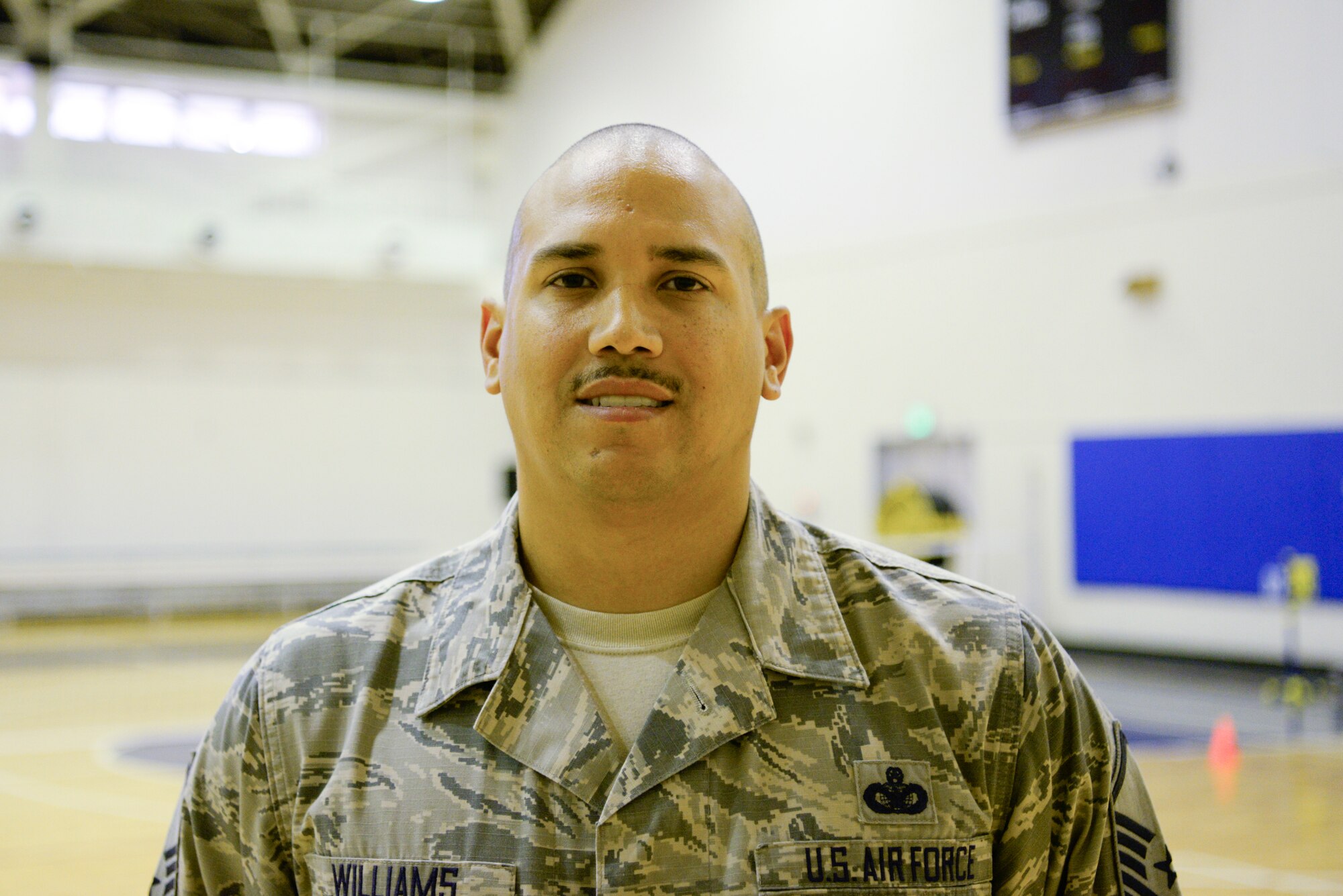 Master Sgt. Brian Williams, 341st Training Squadron operations superintendent, Lackland Air Force Base, TX, poses for a photo in the Samurai Fitness Center Sept. 26, 2018, at Yokota Air Base, Japan.