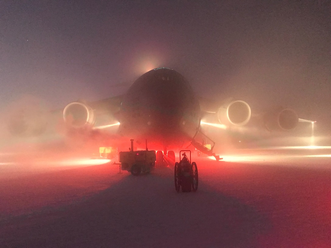 A U.S. Air Force C-17 Globemaster III sits on the runway at McMurdo Station, the Antarctic. The 304th Expeditionary Air Squadron supported an emergency medical evacuation of two patients on August 25, 2018. (Courtesy photo)