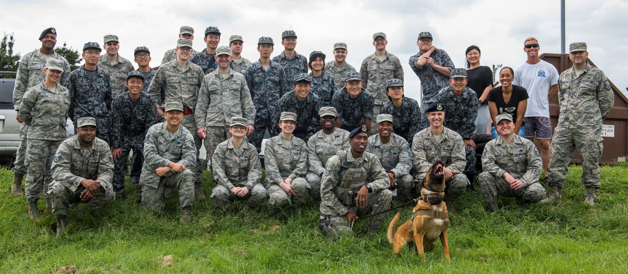 U.S. Air Force and Japan Air Self-Defense Force members pose for a photo