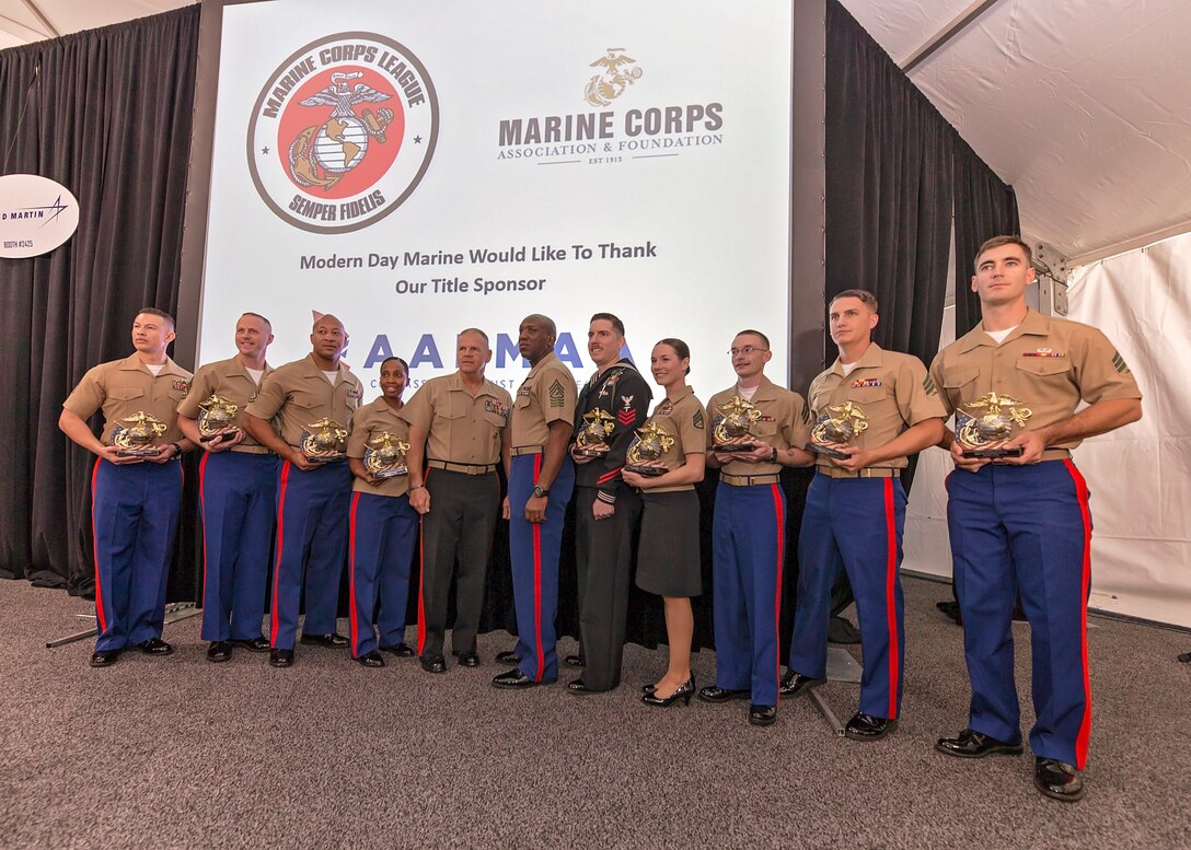 U.S. Marines and a U.S. Navy Chief Hospital Corpsman receive awards from Gen. Robert Neller, commandant of the Marine Corps, and Sgt. Maj. of the Marine Corps Ronald Green, at the 36th annual United States Marine Corps Enlisted Awards Parade and Presentation on Marine Corps Base Quantico, Va., Sept. 26, 2018. The presentation is held to recognize individual achievements of enlisted Marines and Sailors throughout the Marine Corps. (U.S. Marine Corps photo by James H. Frank)