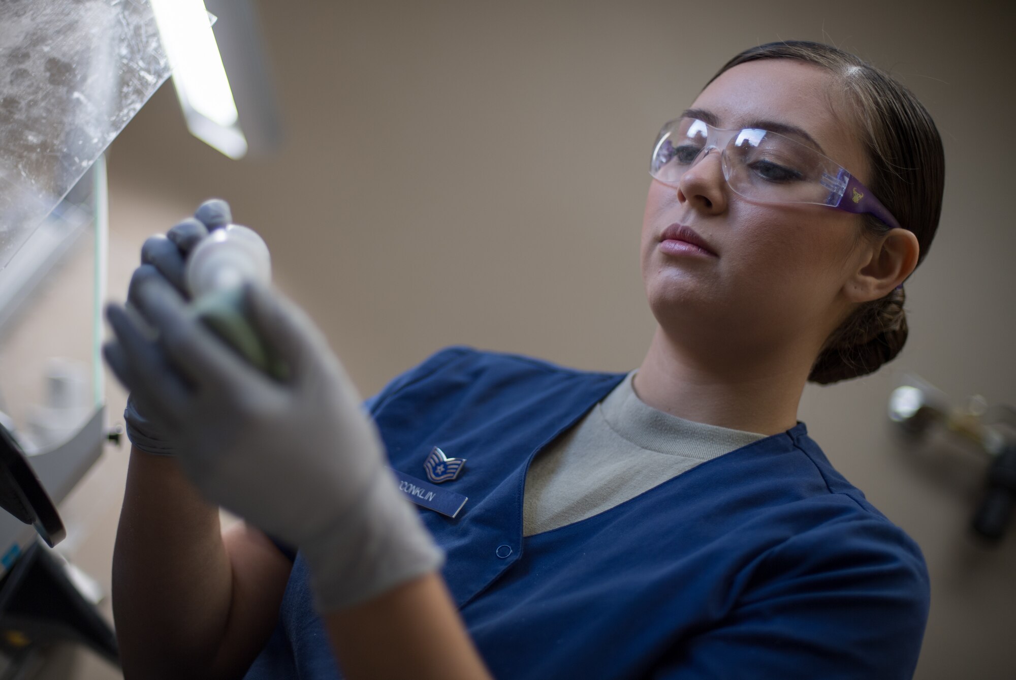 Staff Sgt. Kimberly Conklin, 2nd Dental Squadron dental laboratory NCO in-charge, works on making a retainer at Barksdale Air Force Base, La., Aug. 30, 2018. When dentists bring new impressions to the lab, technicians must stop what they are doing and immediately fill the impression before it can no longer be used. (U.S. Air Force photo by Senior Airman Stuart Bright)