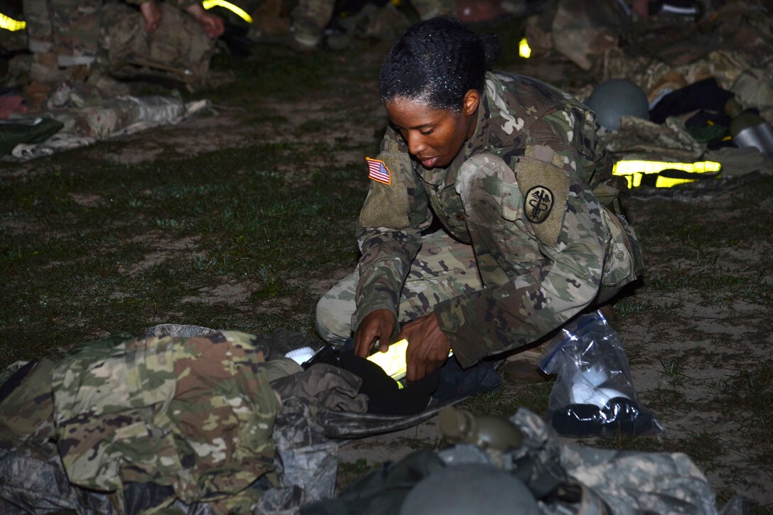 Soldiers participate in a ruck march on the final day of an air assault course.