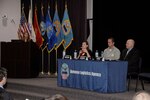 Panelists discuss labor trafficking during an awareness workshop held at Battle Creek’s Hart-Dole-Inouye Federal Center Sept. 26.