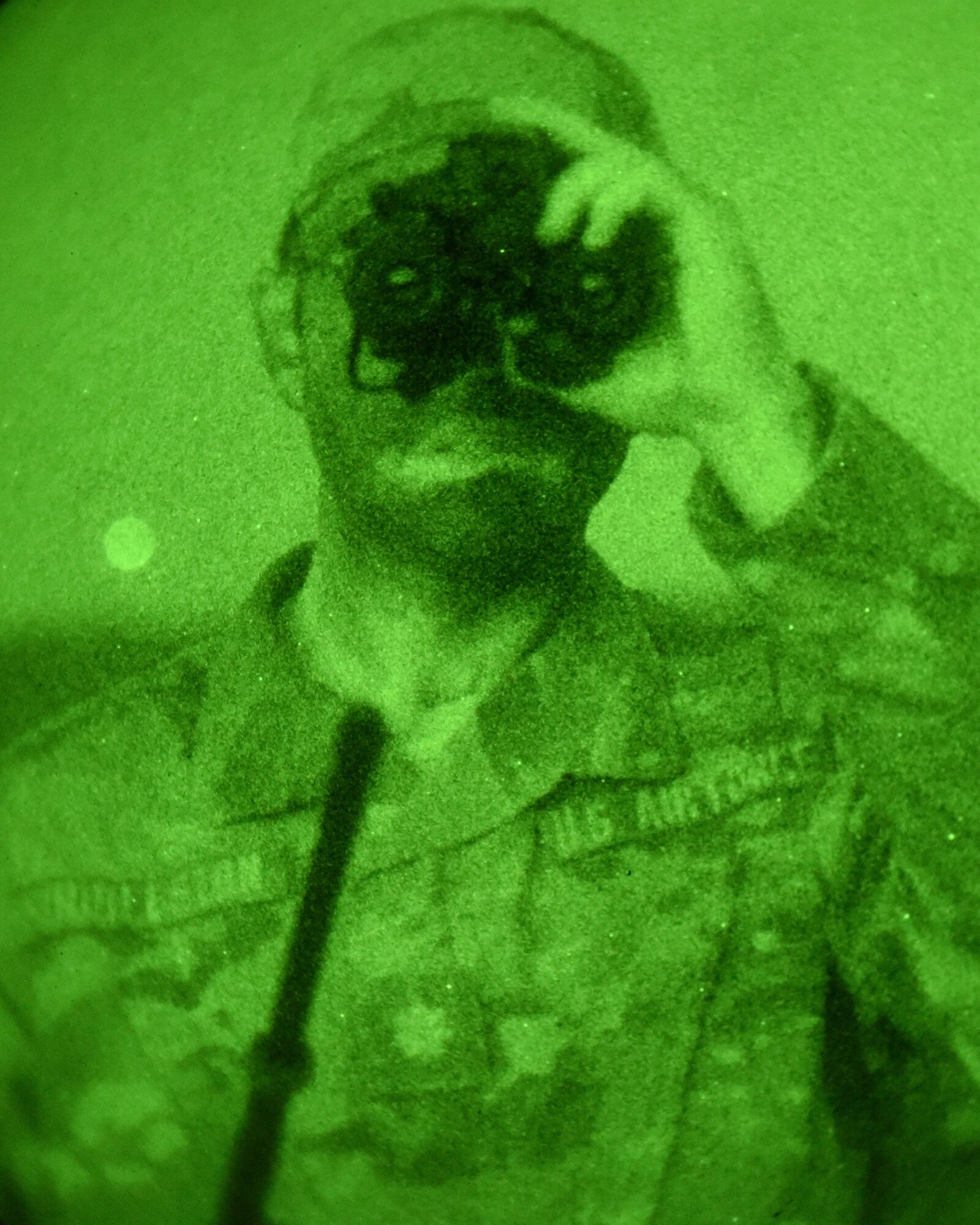 Maj. Andrew Huddleston, 4th Air Support Operations Squadron air mobility liaison officer, watches airdrops during Saber Junction 18, Germany, Sept. 20, 2018. Air Mobility Liaison Officers are rated officers assigned to units from other branches to help coordinate airlift and airdrop support provided by the U.S. Air Force. (U.S. Air Force Photo by Staff Sgt. Lauren O'Connor)