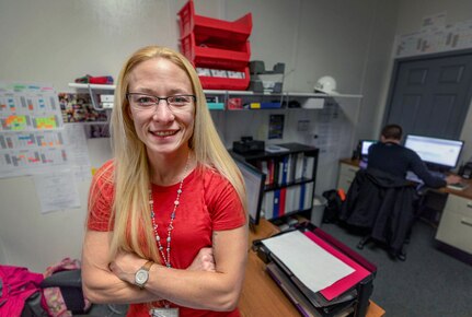 Annie Mathis, a Puget Sound Naval Shipyard & Intermediate Maintenance Facility occupational safety and health specialist with the Everett Detachment, helps equip the workforce at the detachment with the tools and knowledge they need for a safe work environment