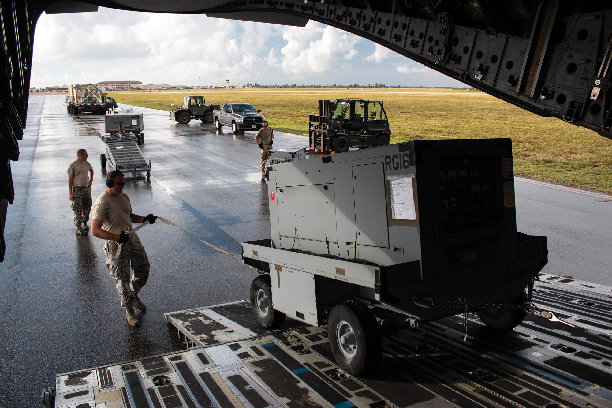 A C-17 Globemaster III from the 445th Airlift Wing delivers members of the 920th Rescue Wing, Patrick Air Force Base, Florida, and equipment to Moody Air Force Base, Georgia Sept 13, 2018. The personnel are assigned to assist with the Hurricane relief efforts and other areas forecasted to be affected by massive flooding due to impending rain.