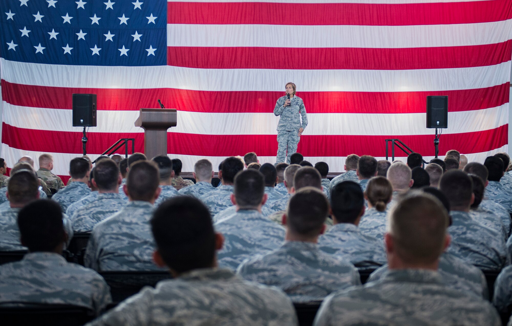Col. Jennifer Short, 23d Wing commander, addresses Team Moody during a commander’s call, Sept. 24, 2018, at Moody Air Force Base, Ga. Short used the opportunity to communicate directly with Team Moody Airmen, update them on local and national objectives and initiatives and highlight superior performers. (U.S. Air Force photo by Andrea Jenkins)