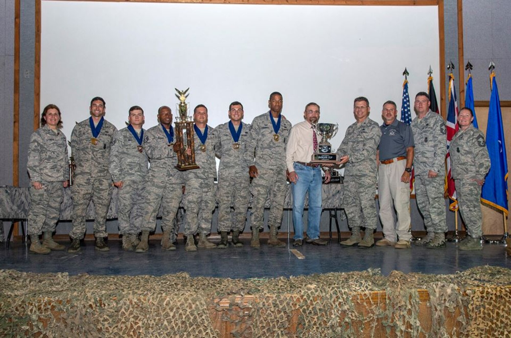 The Air Mobility Command team receives the Sadler Cup for best final score in dismounted operations during the 2018 Defender Challenge award ceremony at Joint Base San Antonio, Texas, Sept. 13, 2018.  The objective of the challenge was to measure strength, endurance, agility, teamwork, leadership, problem-solving and knowledge of core skills. (Courtesy Photo)