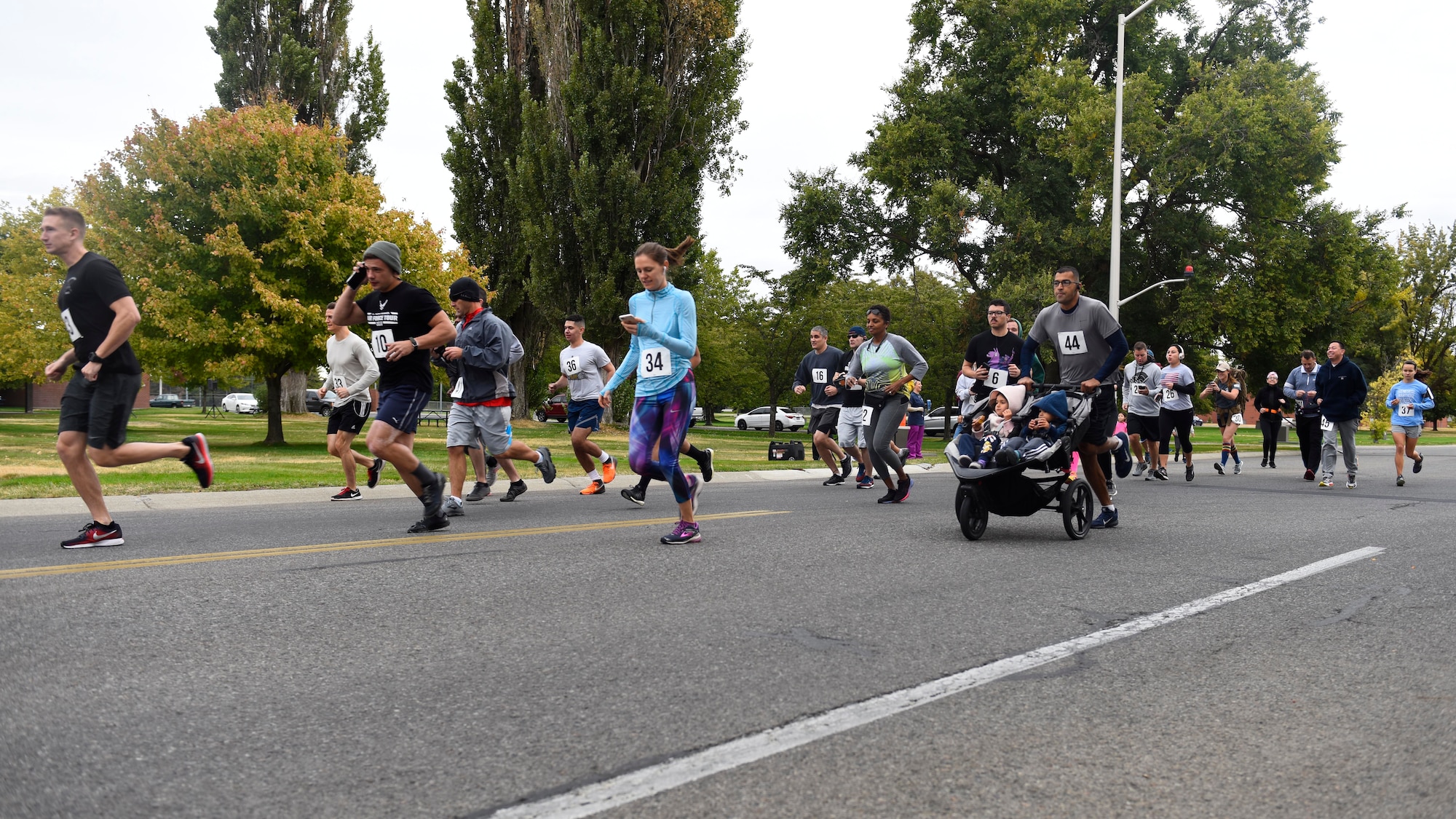 Runners participate in the CMSAF Binnicker 9K Memorial Run Sept. 22, 2018, at Miller Park in Fairchild Air Force Base, Washington. (U.S. Air Force photo/Airman 1st Class Lawrence Sena)