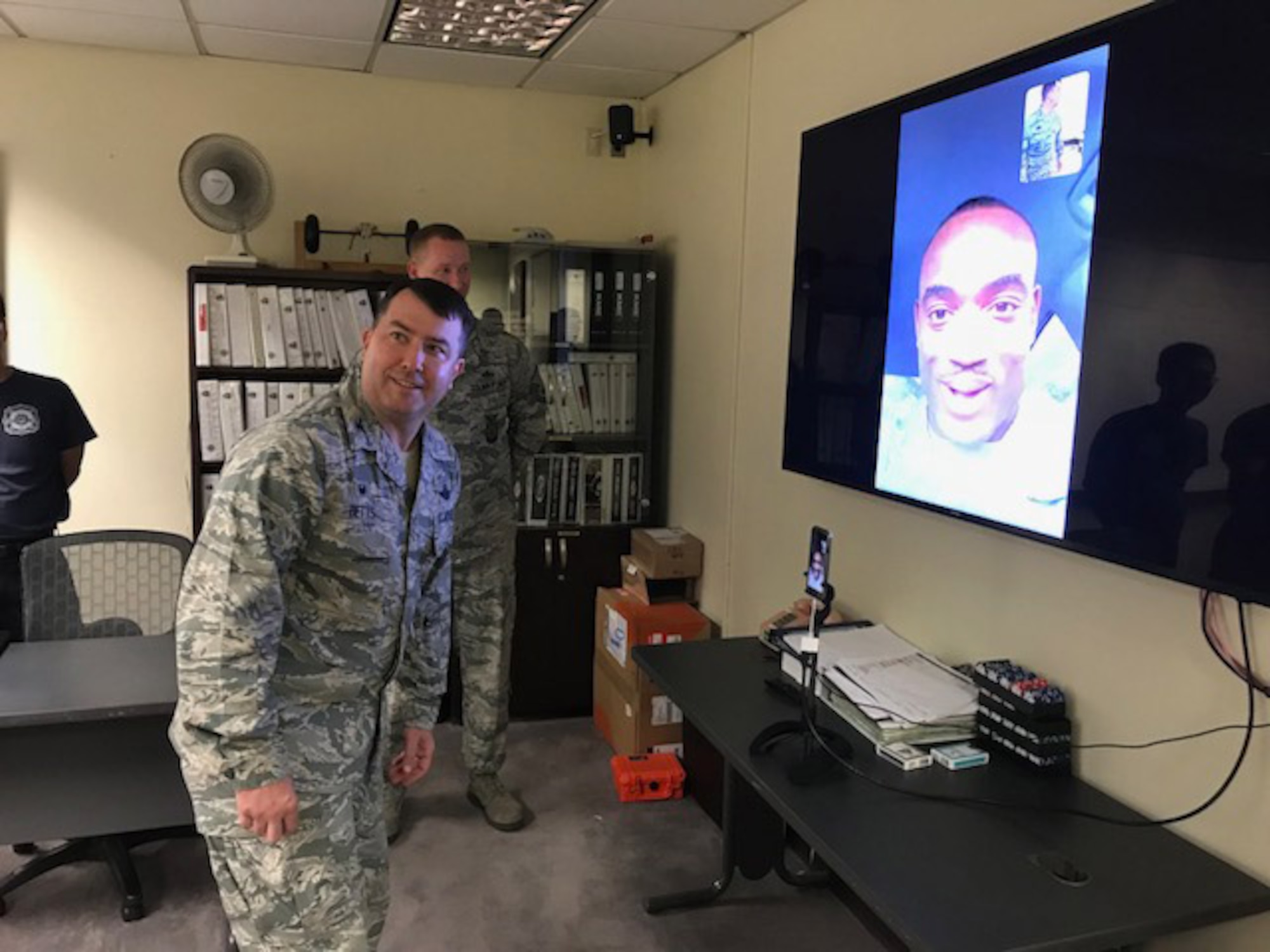 Col. William Betts, 51st Fighter Wing commander, speaks to Staff Sgt., Gregory Francois, formerly of the 51st Civil Engineer Squadron, and promotes him to the rank of technical sergeant through the Air Force’s STEP (Stripes for Exceptional Performers) program via FaceTime from Osan Air Base, Republic of Korea, Sept. 27, 2018.