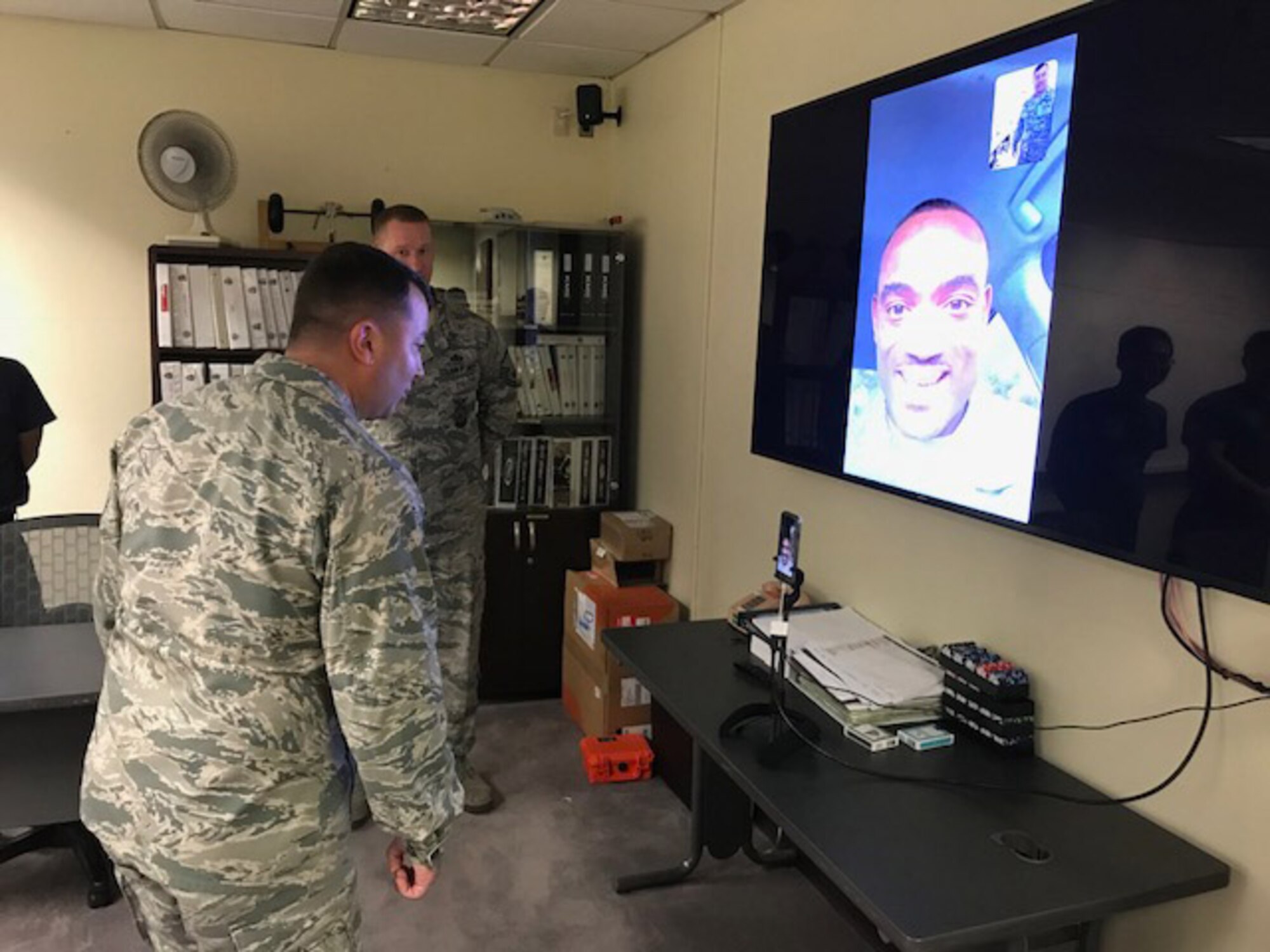 Col. William Betts, 51st Fighter Wing commander, speaks to Staff Sgt., Gregory Francois, formerly of the 51st Civil Engineer Squadron, and promotes him to the rank of technical sergeant through the Air Force’s STEP (Stripes for Exceptional Performers)program via FaceTime from Osan Air Base, Republic of Korea, Sept. 27, 2018. The STEP program allows commanders at wing level or above to promote individuals they deem to be outstanding performers. (U.S. Air Force courtesy photo)
