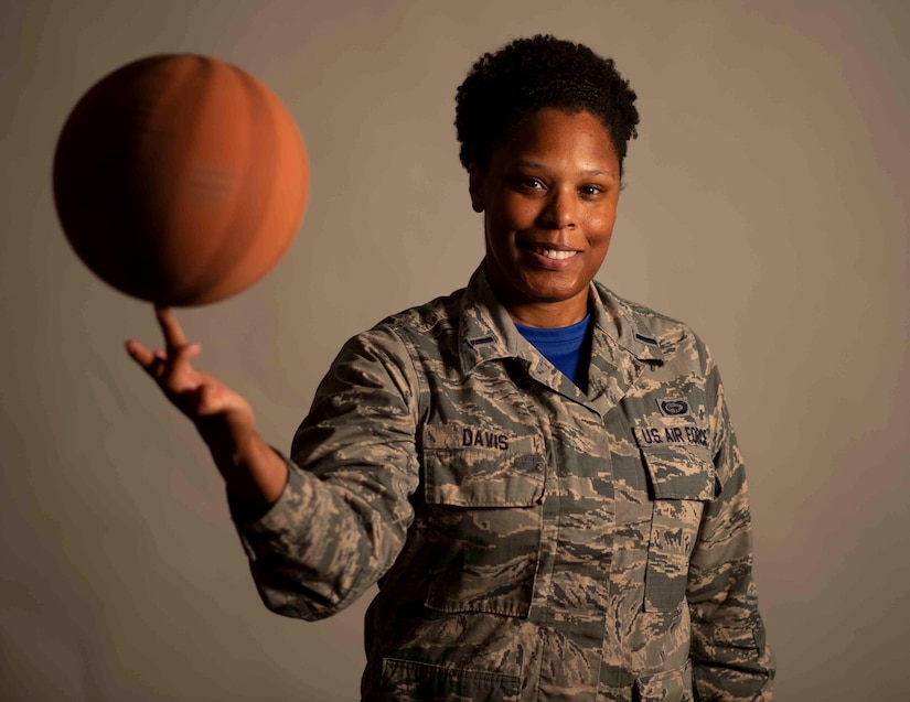 Air Force 1st Lt. Brittnie Davis, Air Mobility Command intelligence officer, shares how hard work and determination helped her achieve her goals of playing basketball and becoming an officer. Air Force photo by Airman 1st Class Tara Stetler