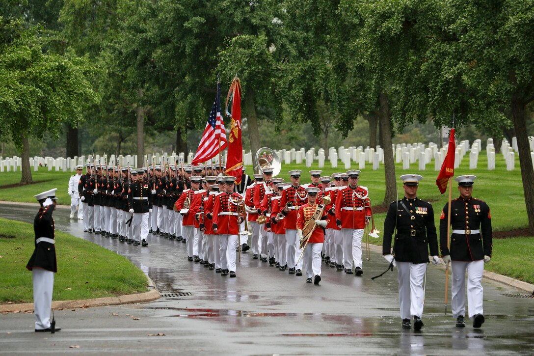 Marines with Marine Barracks Washington D.C. march in formation during a full honors funeral for three formerly unaccounted for Vietnam veterans at Arlington National Cemetery, Arlington, Va., Sept. 27, 2018. Capt. John A. House II, Cpl. Glyn L. Runnels, Jr. and Lance Cpl. John D. Killen III were accounted for on Dec. 22, 2015 and buried together in Arlington. The Marines died when their CH-64A Sea Knight helicopter was struck by enemy fire and crashed, June 30, 1967. House, who piloted the helicopter, was attempting to insert eight members of Company A, 3rd Reconnaissance Battalion, 3rd Marine Division, into hostile territory in Thau Thien-Hue Province, Vietnam, when enemy forces attacked from a surrounding tree line. Lance Cpl. Merlin R. Allen and Navy Hospital Corpsman Michael B. Judd also died during the crash and were individually identified in 2013. (U.S. Marine Corps photo by Sgt. Robert Knapp/Released)