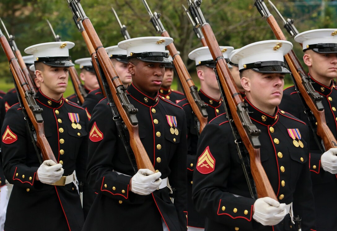 Marines with 2nd platoon, Bravo Company, Marine Barracks Washington D.C., march in formation during a full honors funeral for three formerly unaccounted for Vietnam veterans at Arlington National Cemetery, Arlington, Va., Sept. 27, 2018.