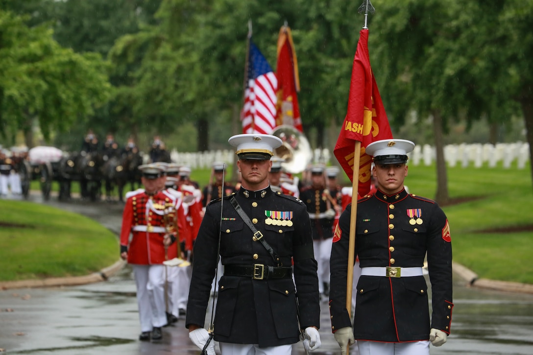Marines with Marine Barracks Washington D.C. march in formation during a full honors funeral for three formerly unaccounted for Vietnam veterans at Arlington National Cemetery, Arlington, Va., Sept. 27, 2018. Capt. John A. House II, Cpl. Glyn L. Runnels, Jr. and Lance Cpl. John D. Killen III were accounted for on Dec. 22, 2015 and buried together in Arlington. The Marines died when their CH-64A Sea Knight helicopter was struck by enemy fire and crashed, June 30, 1967. House, who piloted the helicopter, was attempting to insert eight members of Company A, 3rd Reconnaissance Battalion, 3rd Marine Division, into hostile territory in Thau Thien-Hue Province, Vietnam, when enemy forces attacked from a surrounding tree line. Lance Cpl. Merlin R. Allen and Navy Hospital Corpsman Michael B. Judd also died during the crash and were individually identified in 2013. (U.S. Marine Corps photo by Sgt. Robert Knapp/Released)