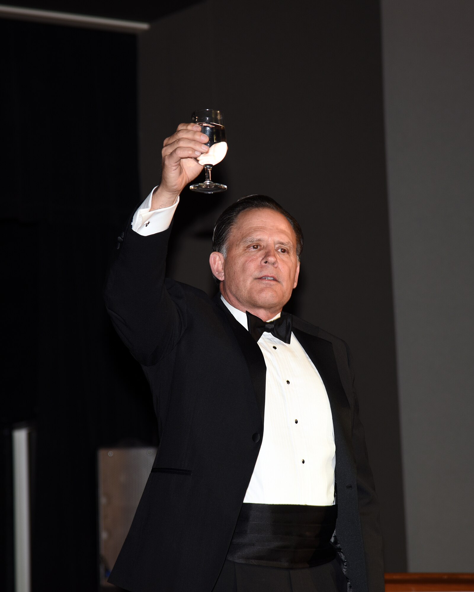 Retired Maj. Gen. Jack Catton Jr., this year’s guest speaker and former 14th Flying Training Wing commander, proposes a toast during the 2018 Air Force Birthday Ball Sept. 22, 2018, in Columbus, Mississippi. During his speech, Catton expressed how proud he is of the relationship between the base and local community and how the team BLAZE acronym was created. (U.S. Air Force photo by Sharon Ybarra)