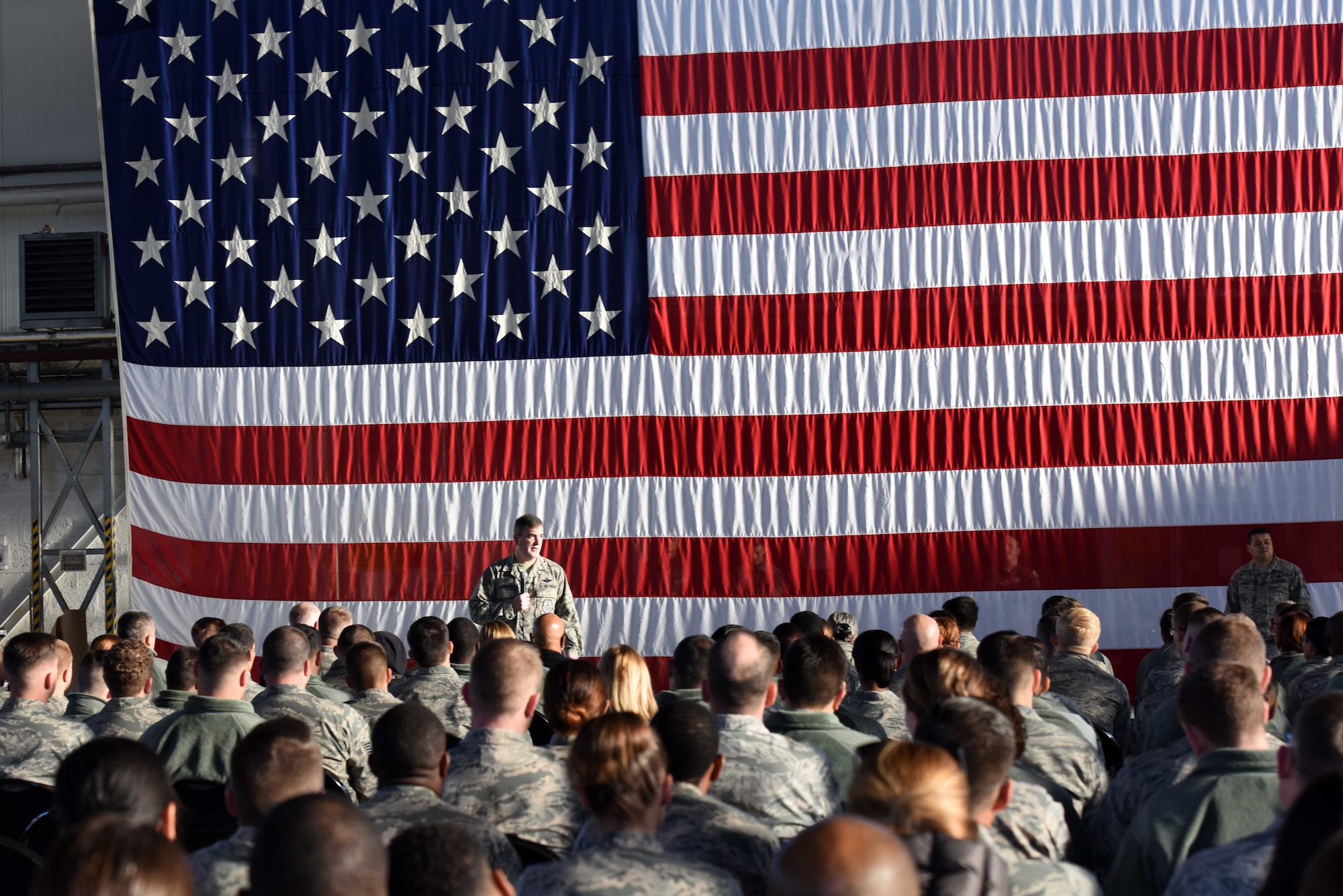 Brig. Gen. Mark August, 86th Airlift Wing commander, addresses Airmen assigned to the 86th AW at an all call on Ramstein Air Base, Germany, Sept. 27, 2018. August outlined his commitment to taking care of Airmen by providing more leadership, resources and recognition.