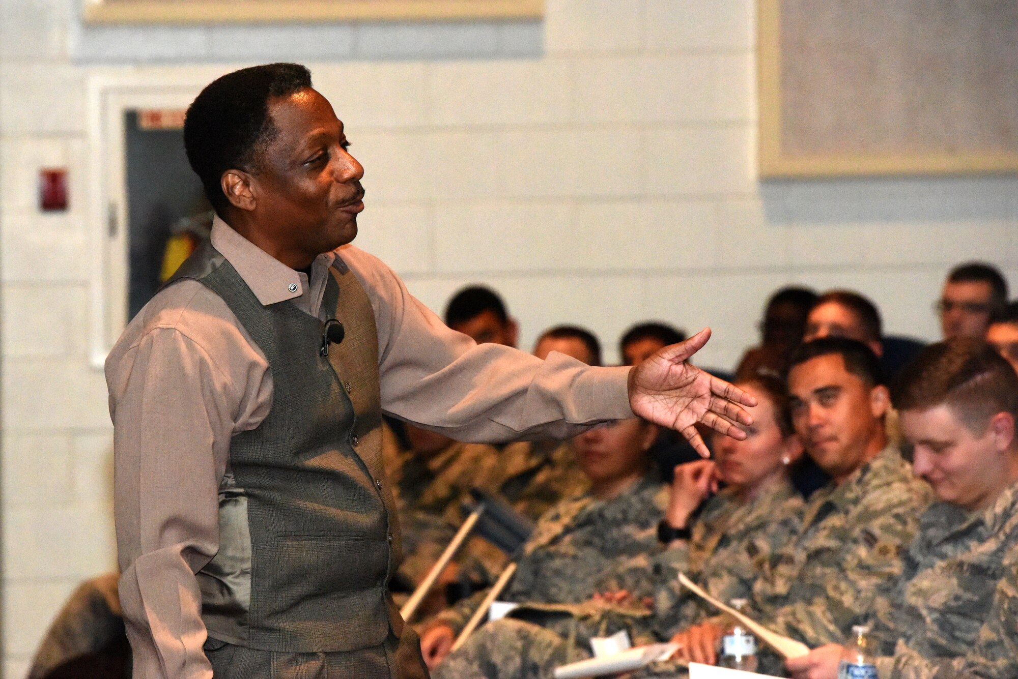 Retired U.S. Air Force Chief Master Sgt. Anthony Brinkley, guest speaker for the Goodfellow Total Development Council, shares a personal story with Goodfellow service members during his discussion at the base theater on Goodfellow Air Force Base, Texas, Sept. 26, 2018. Brinkley focused on encouraging junior enlisted members to commit to themselves and help each other through their careers. (U.S. Air Force photo by Airman 1st Class Seraiah Hines/Released)