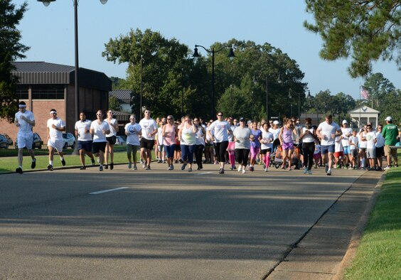 Participants begin the sixth annual Color Run Sept. 22, 2018, at Columbus Air Force Base, Mississippi. The event consisted of a 5K run or a 2-mile run that participants could choose from. (U.S. Air Force photo by Airman Hannah Bean)